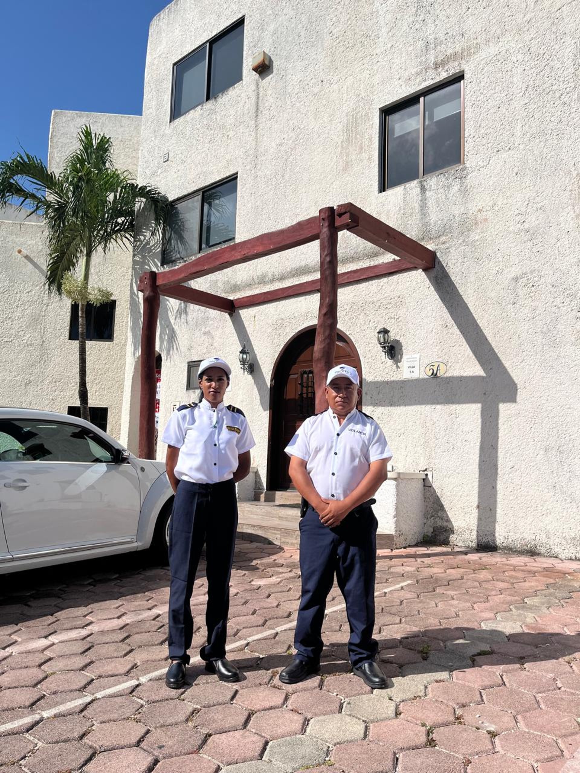 woman wearing yellow long-sleeved dress under white clouds and blue sky during daytime