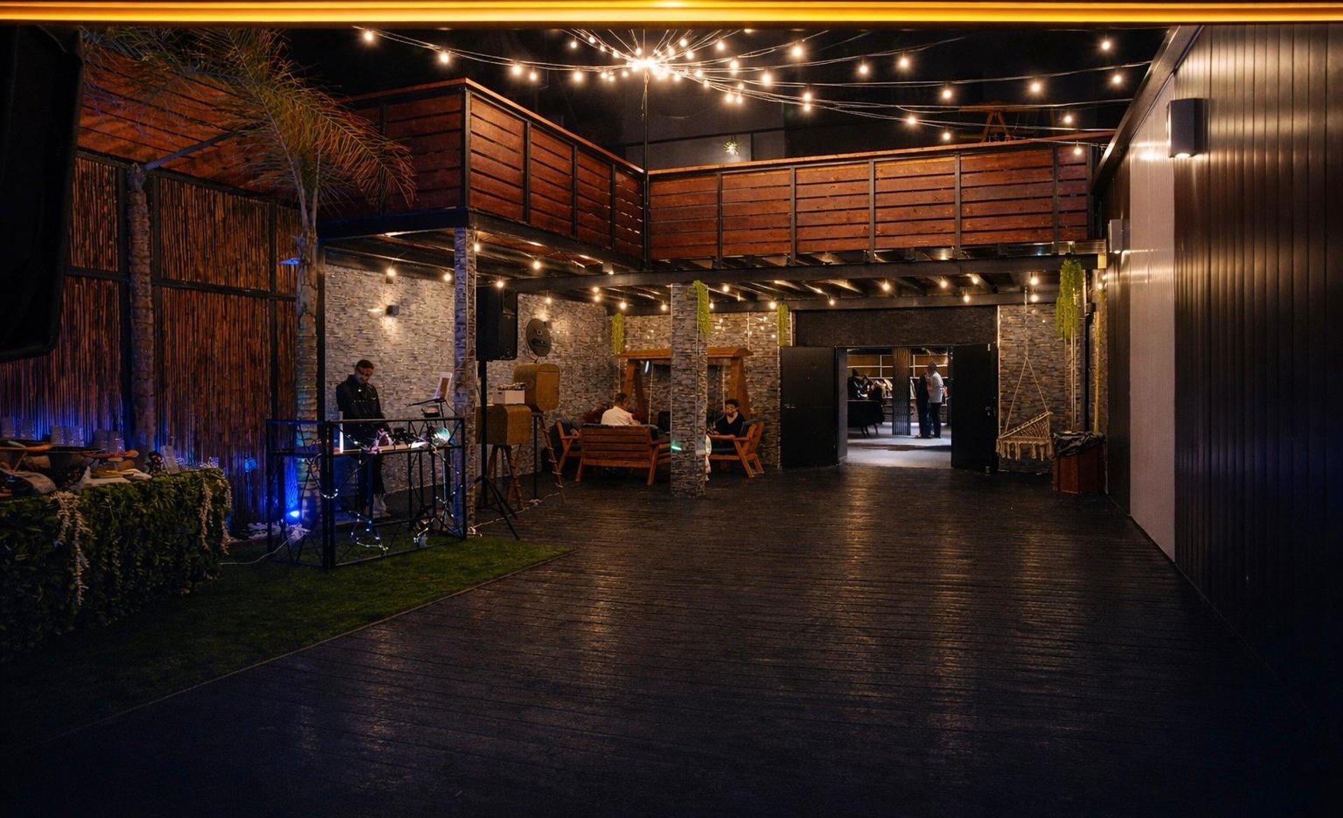 Golden ribbons flowing on a dark background.