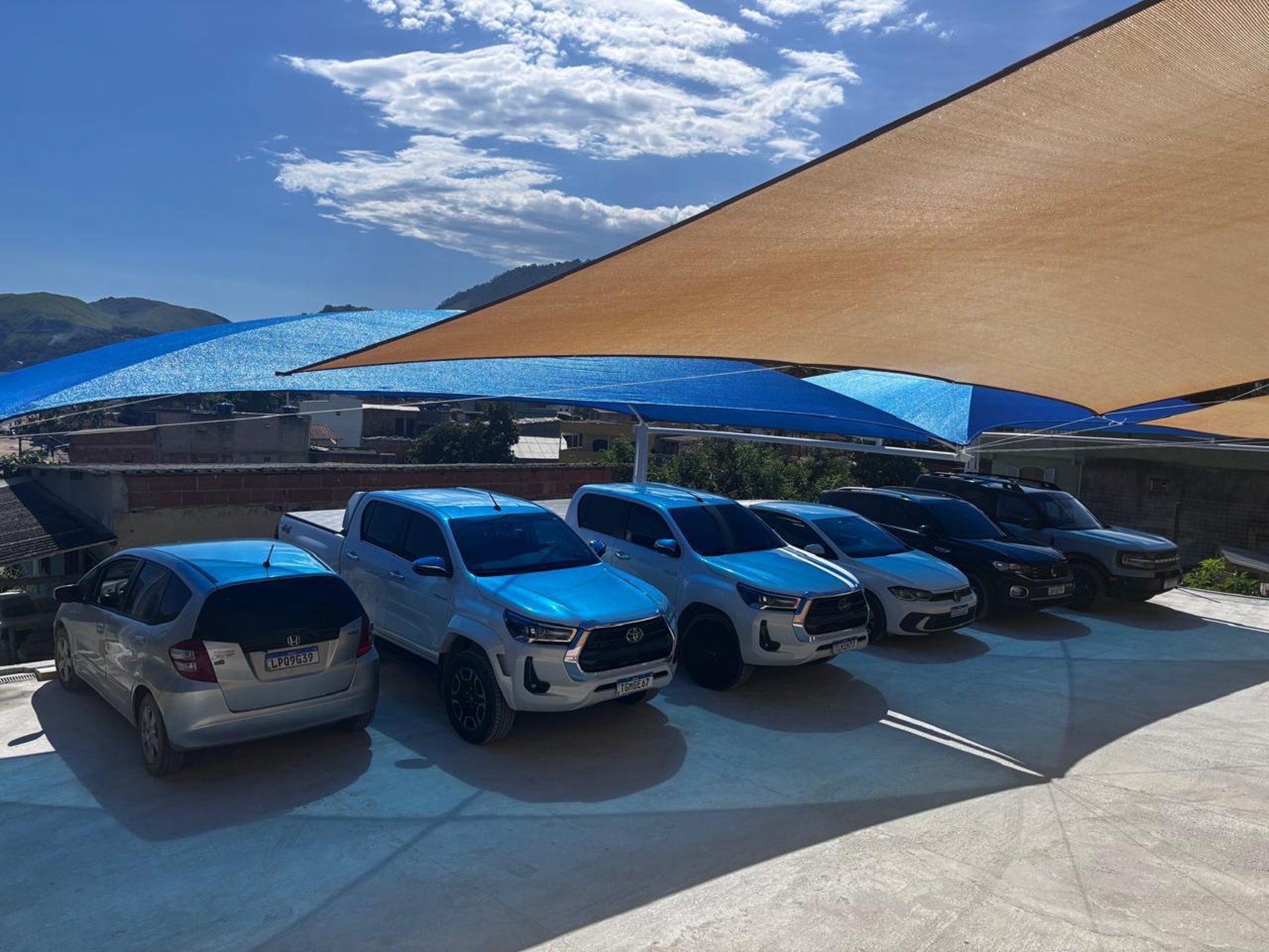 black and brown leather padded tub sofa
