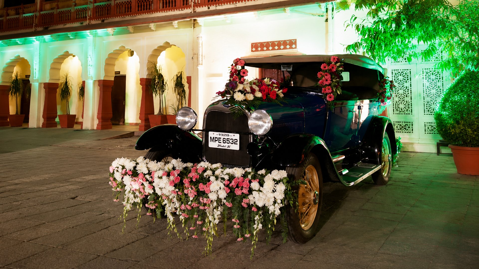 red flowers on white vehicle
