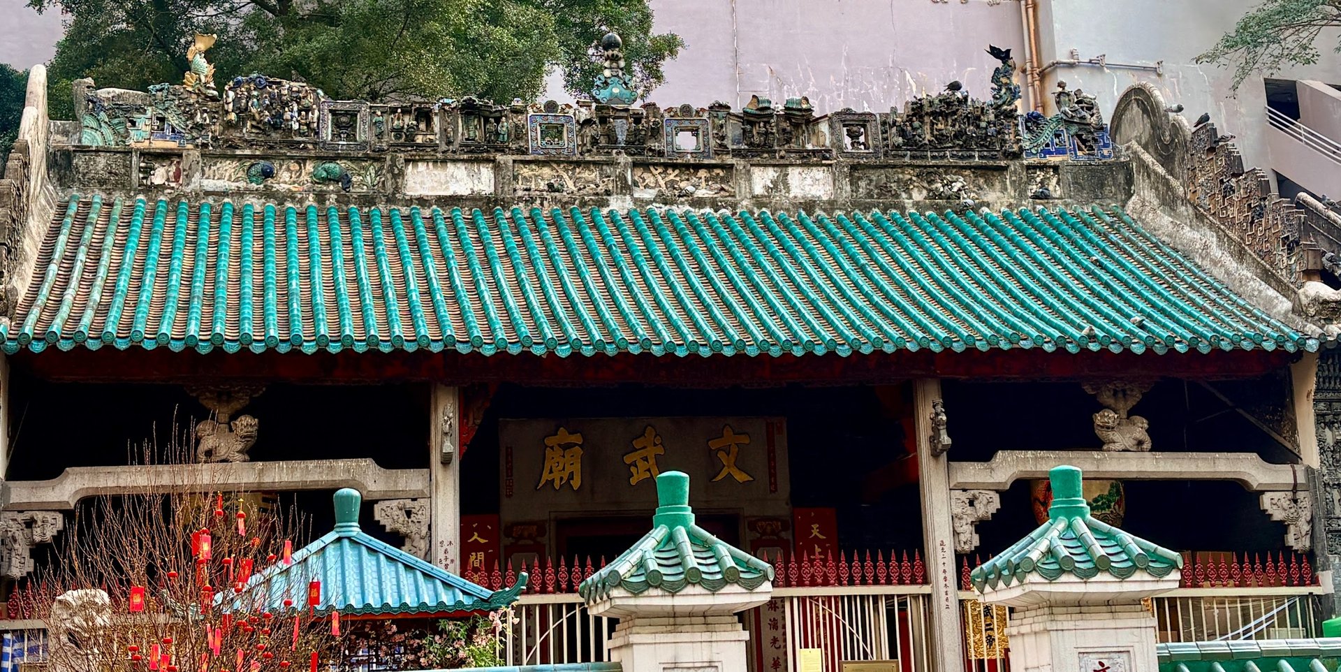 an abstract photo of a curved building with a blue sky in the background