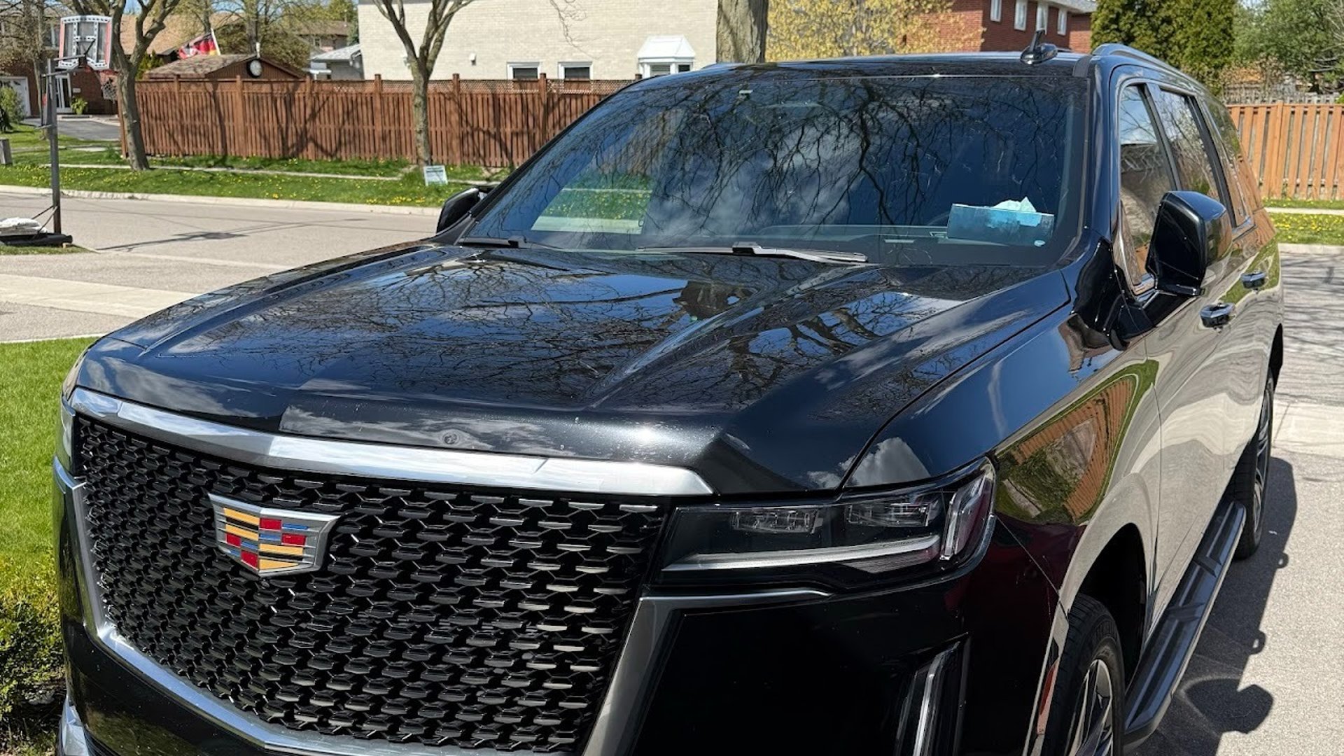 Luxury Cadillac Escalade chauffeur service in Toronto for airport transfers, executive travel and special events