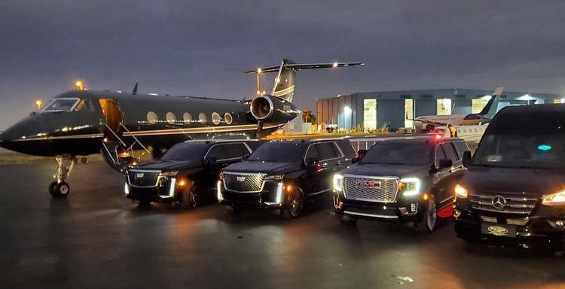 luxury airport chauffeur service toronto pearson privete jet luxury Cadillac escalade GMC yukon Mercedes Sprinter night view 