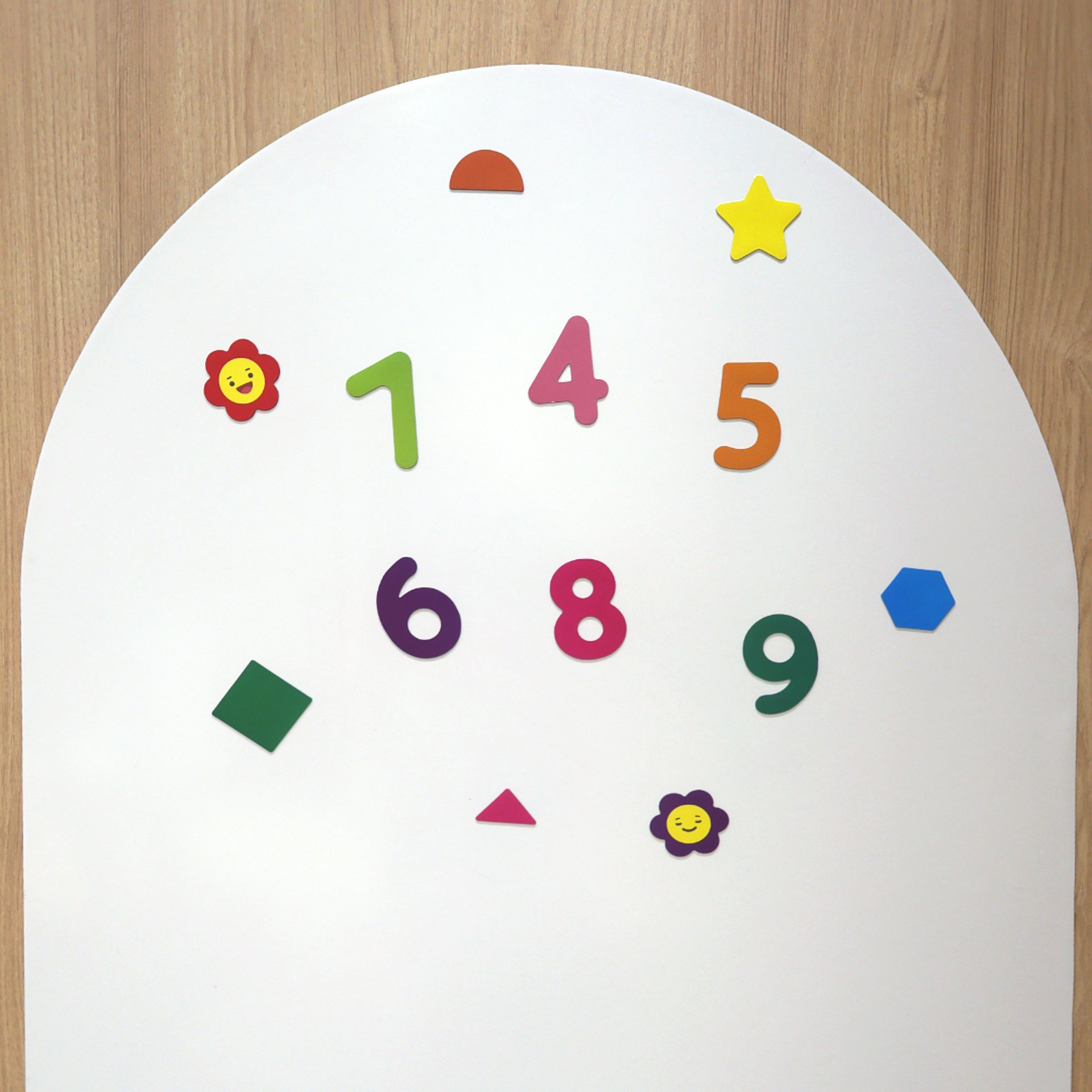 an abstract photo of a curved building with a blue sky in the background