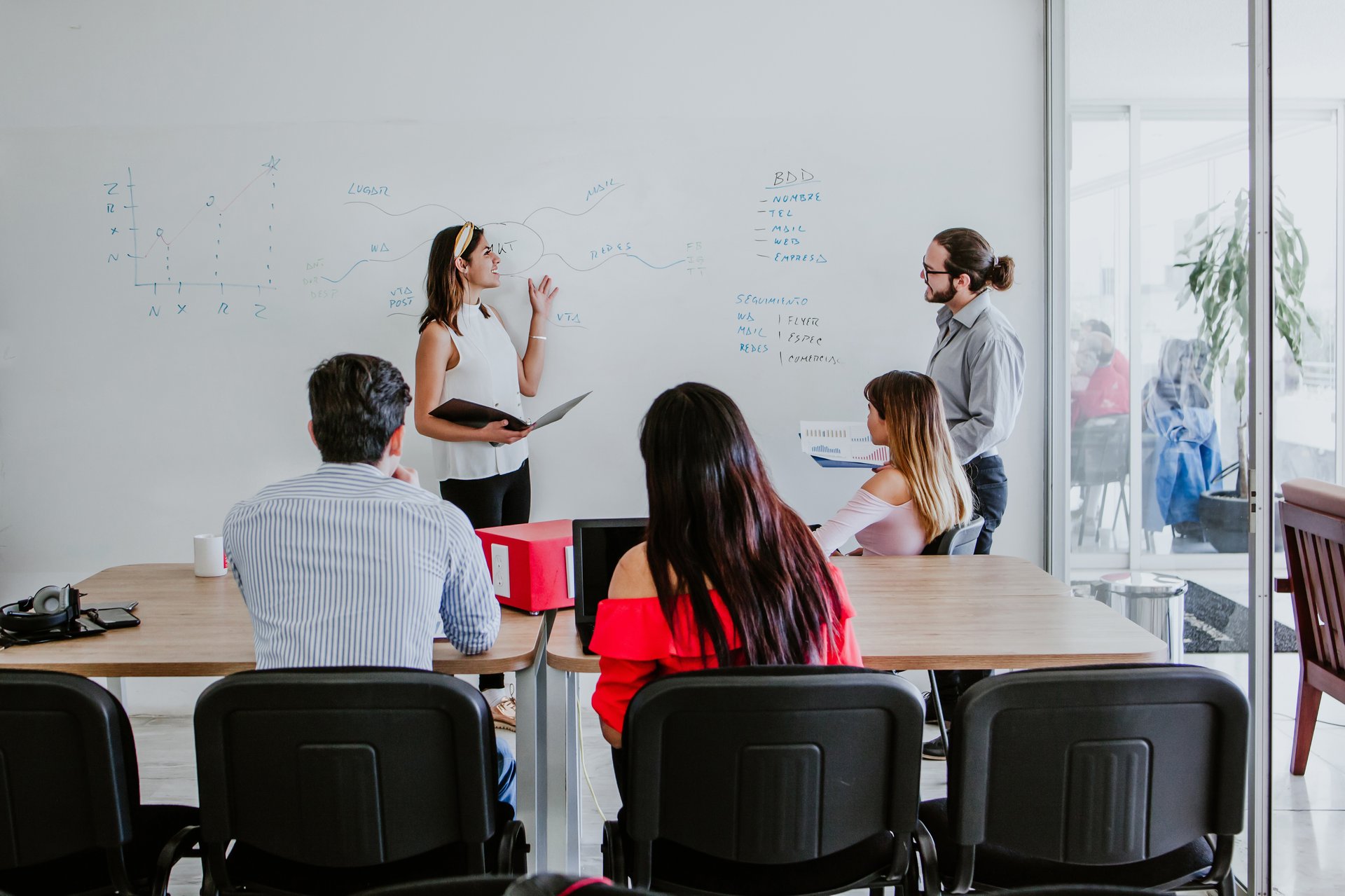 an abstract photo of a curved building with a blue sky in the background