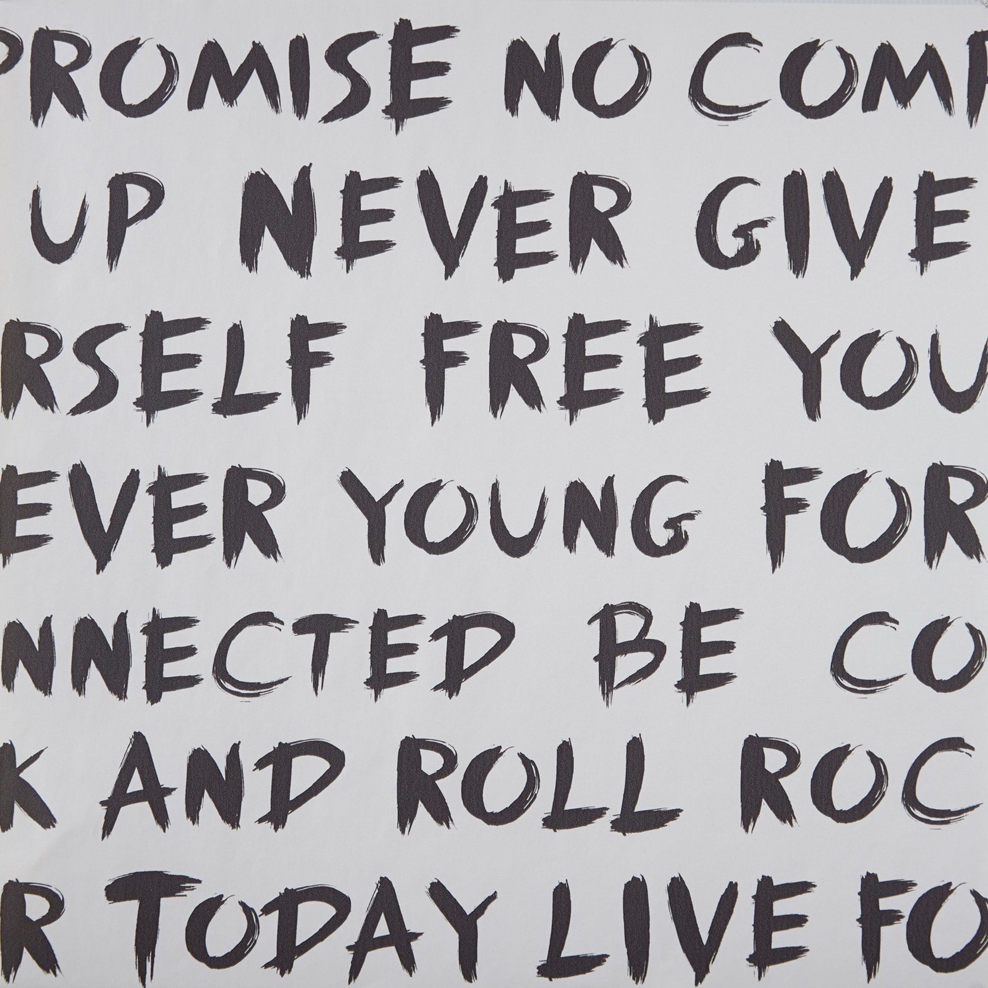 an abstract photo of a curved building with a blue sky in the background