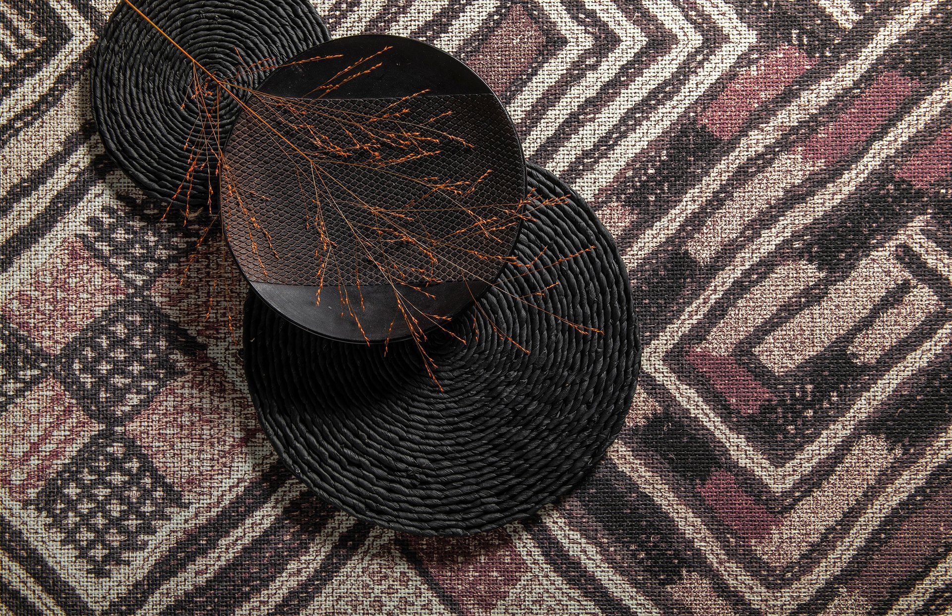 an abstract photo of a curved building with a blue sky in the background