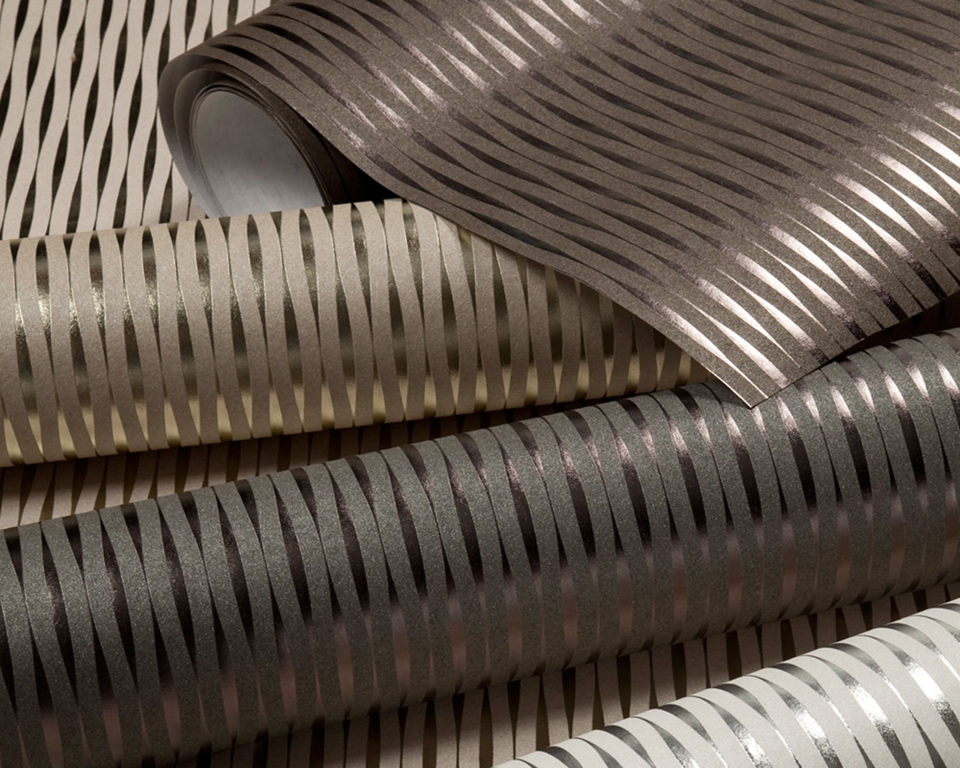 an abstract photo of a curved building with a blue sky in the background