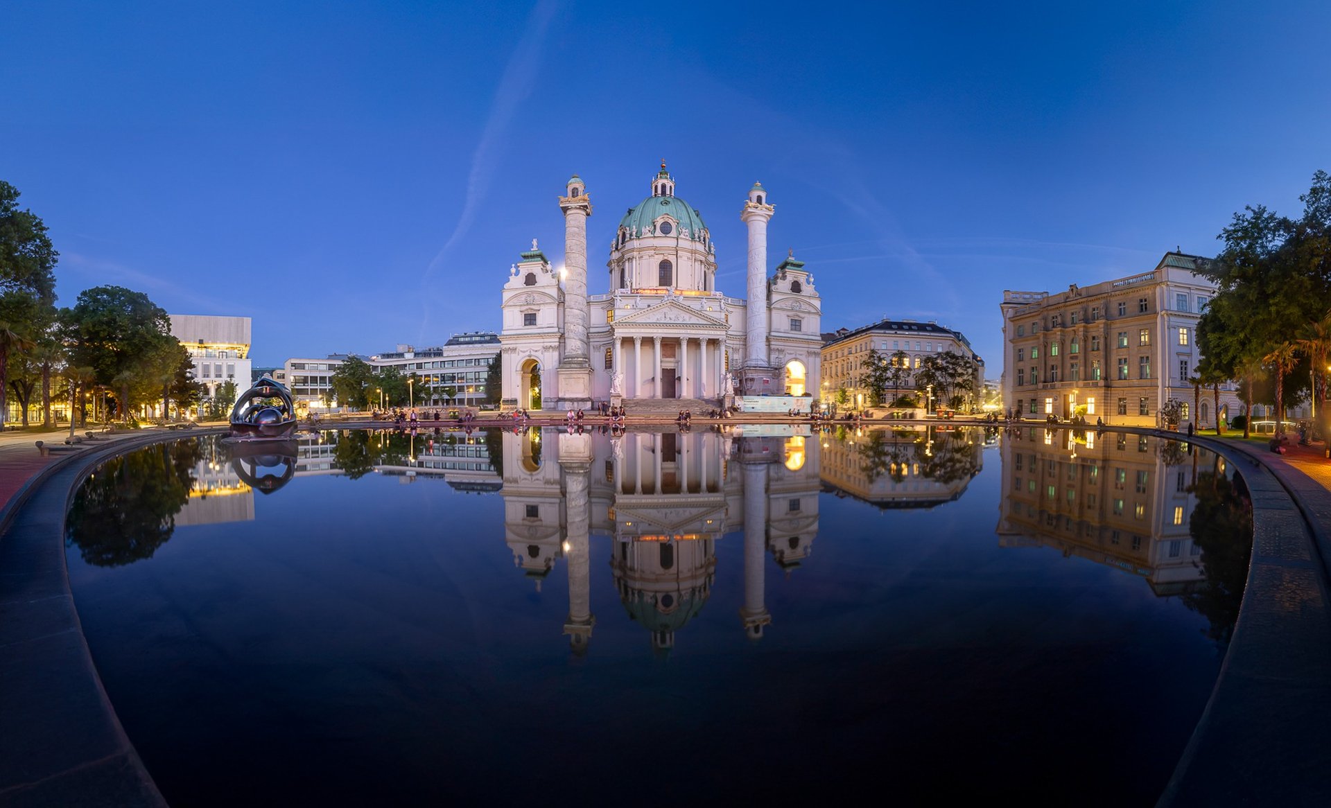 woman wearing yellow long-sleeved dress under white clouds and blue sky during daytime