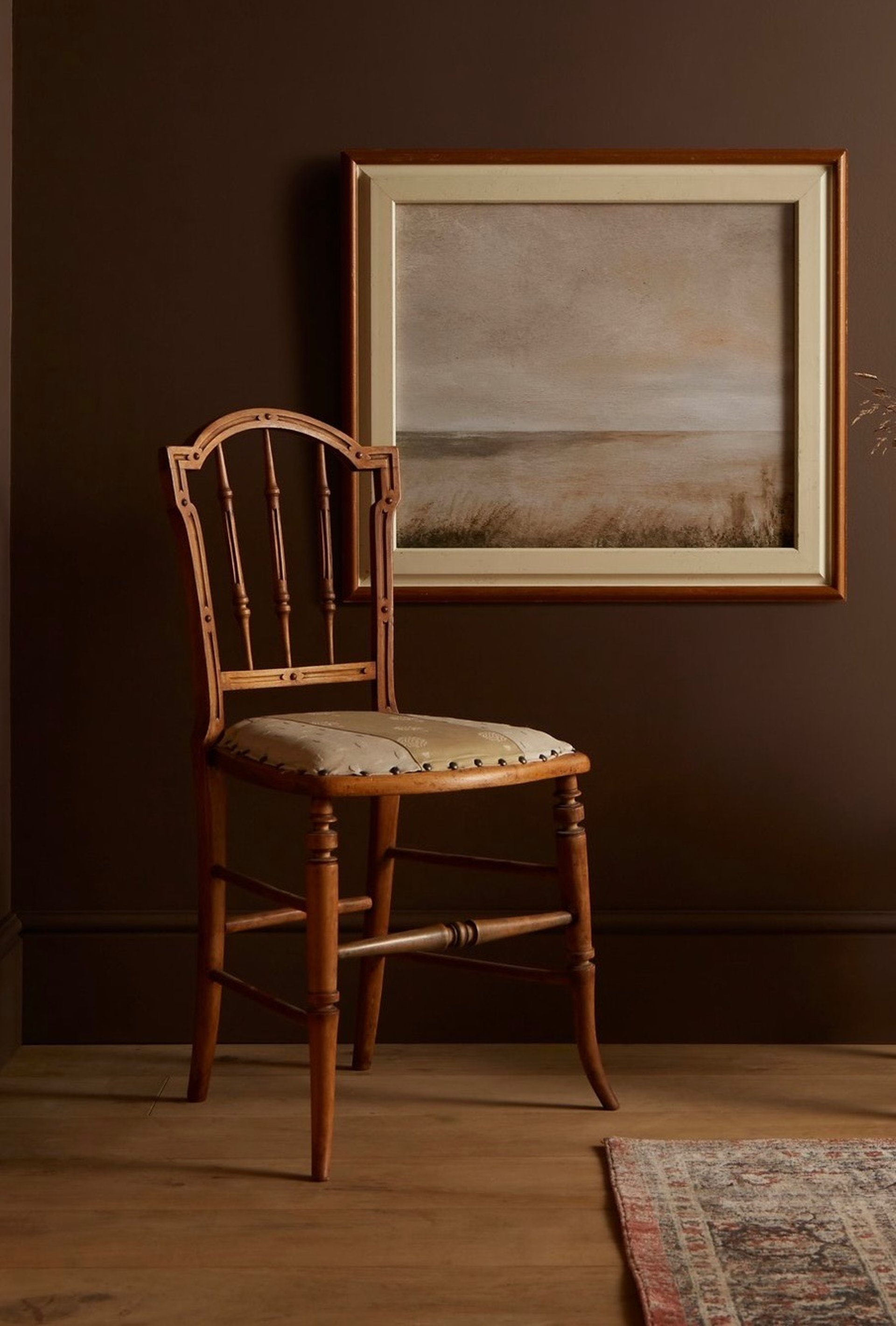 black and brown leather padded tub sofa