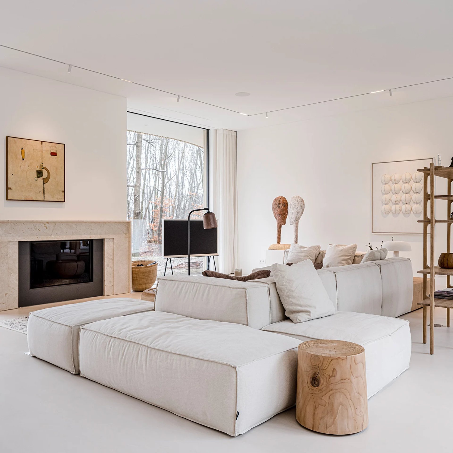 an abstract photo of a curved building with a blue sky in the background