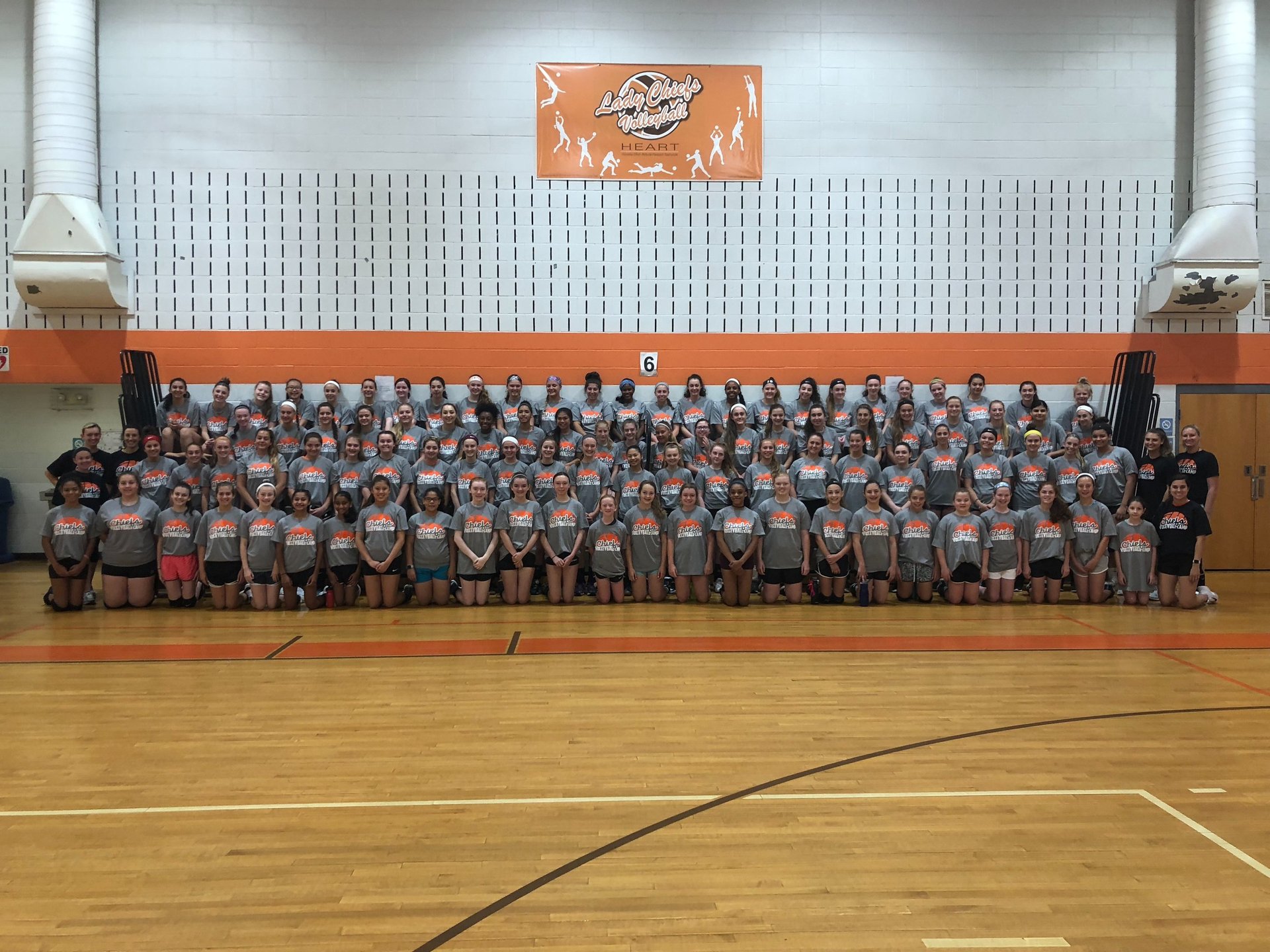 black and brown leather padded tub sofa