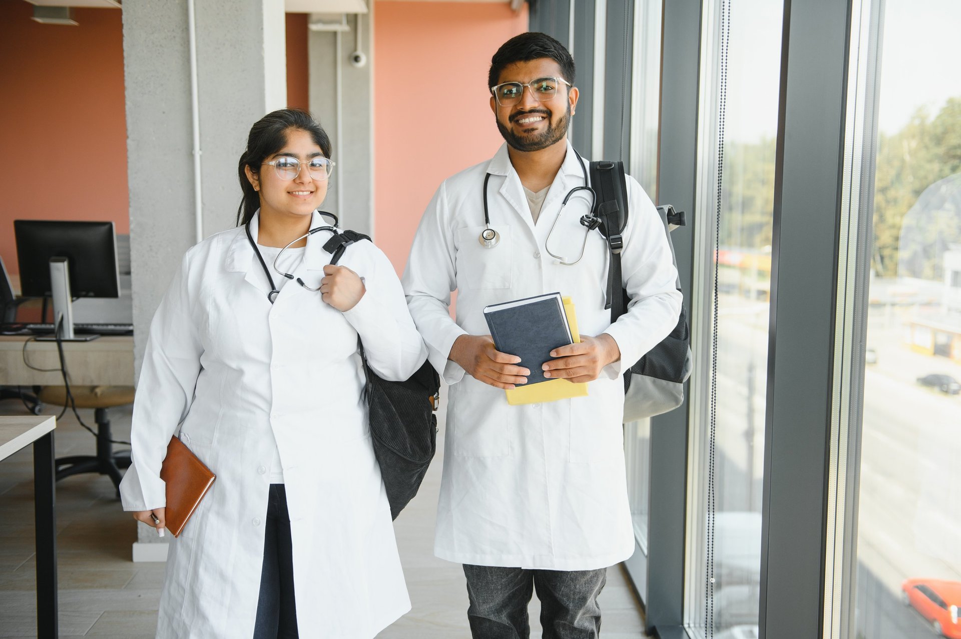 an abstract photo of a curved building with a blue sky in the background