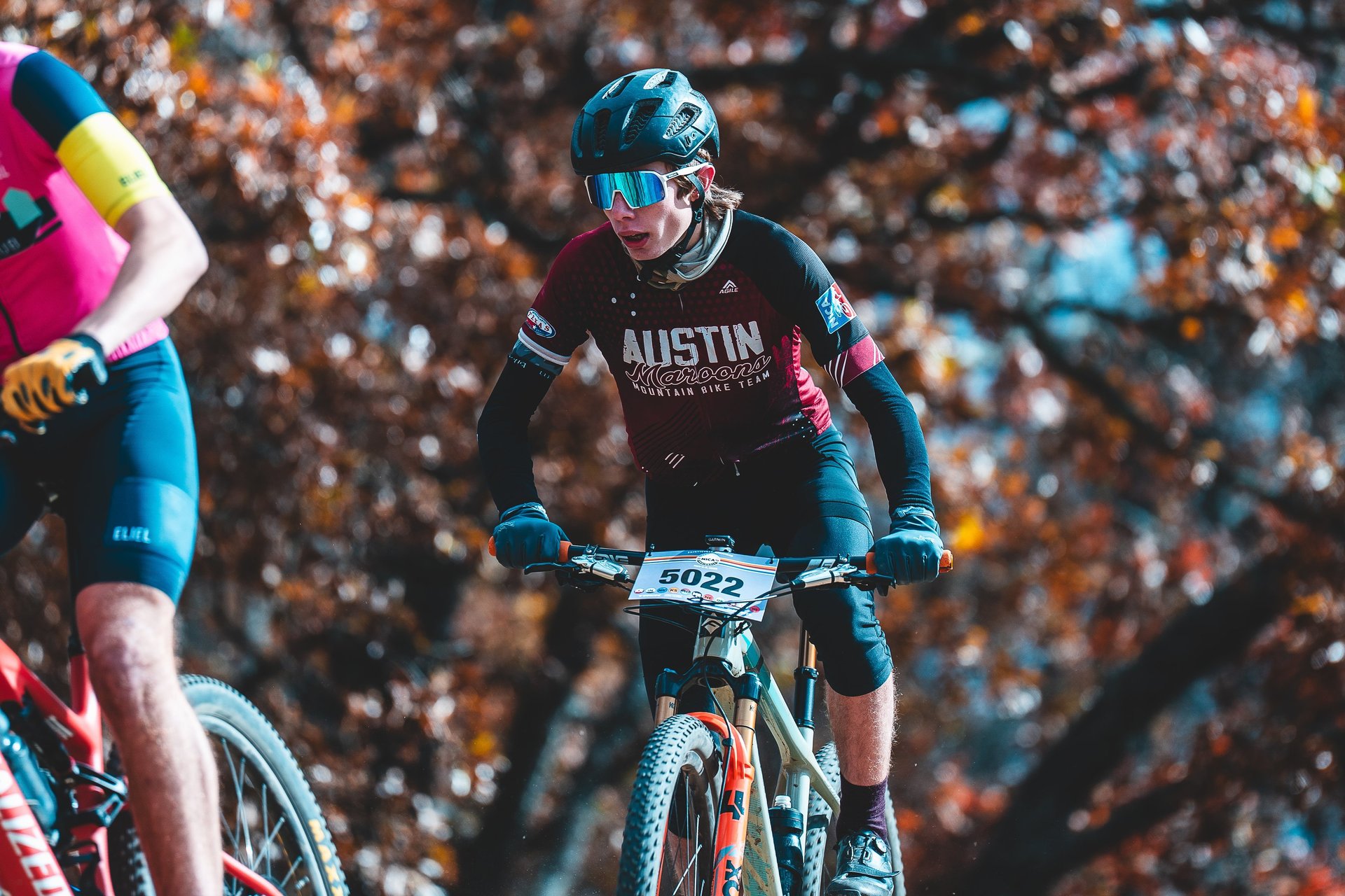 man biking in forest