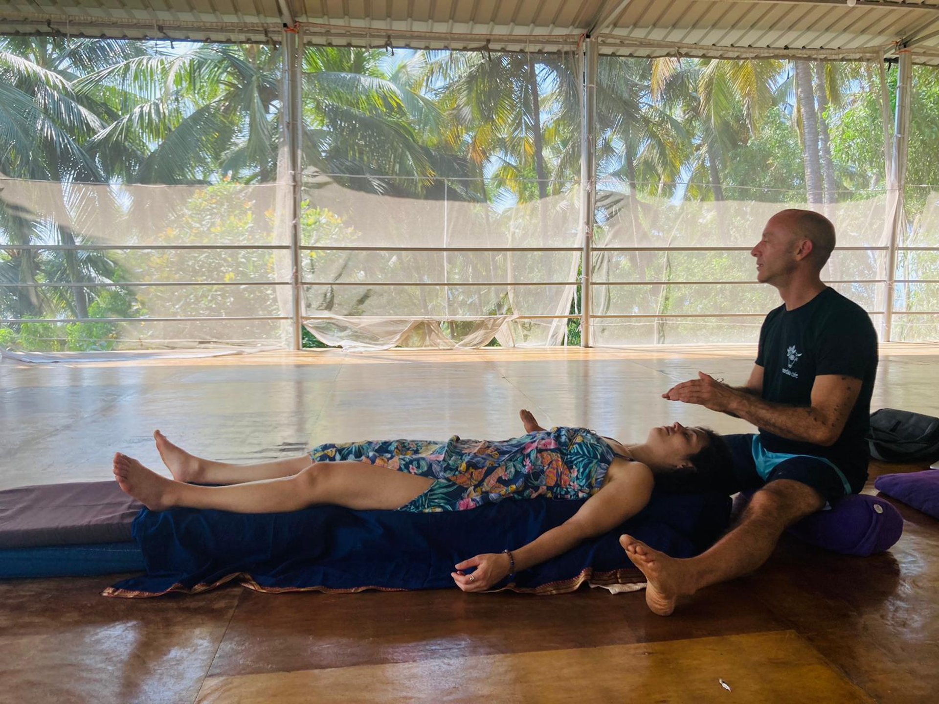 persons hand on top of sun