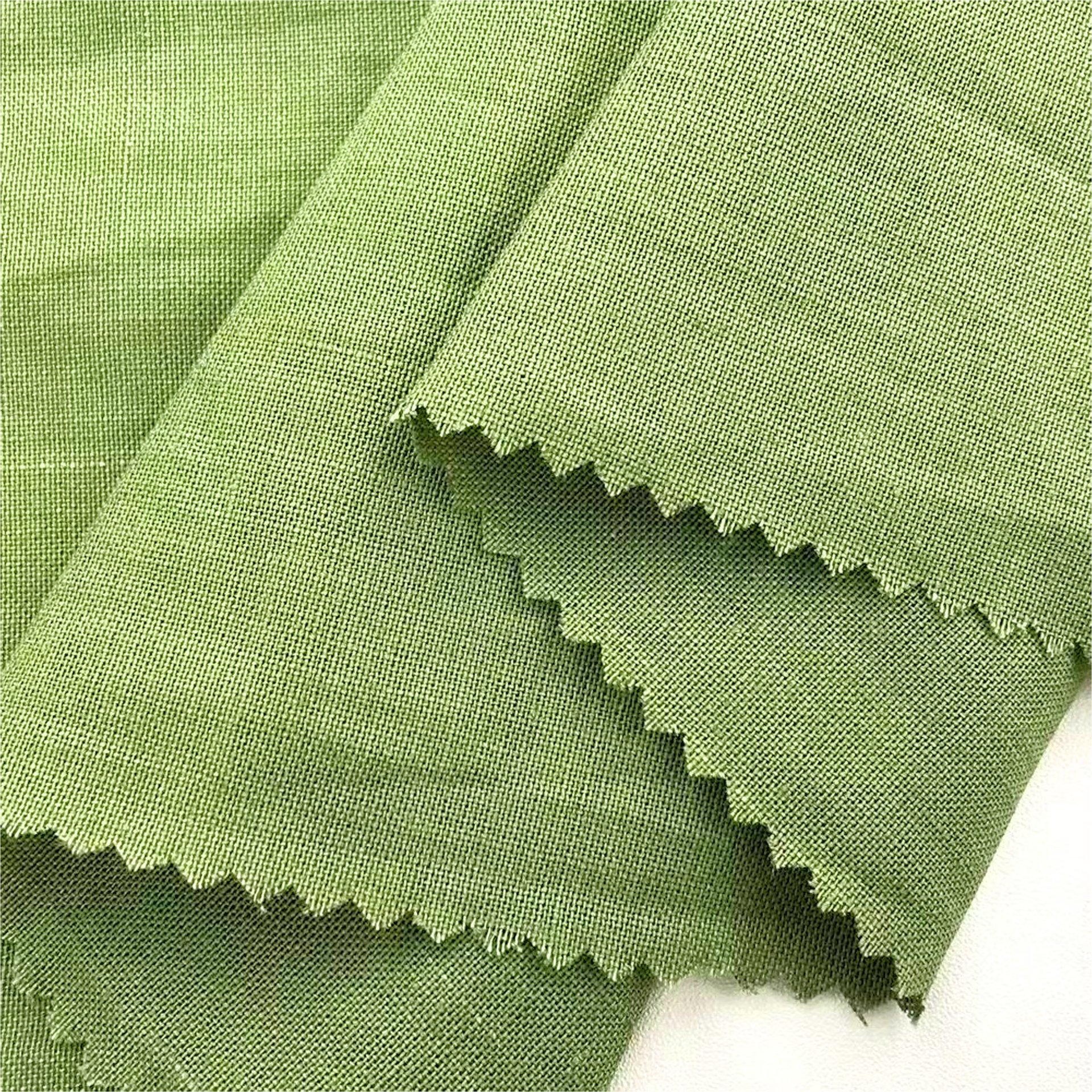 a close up view of a teal colored fabric