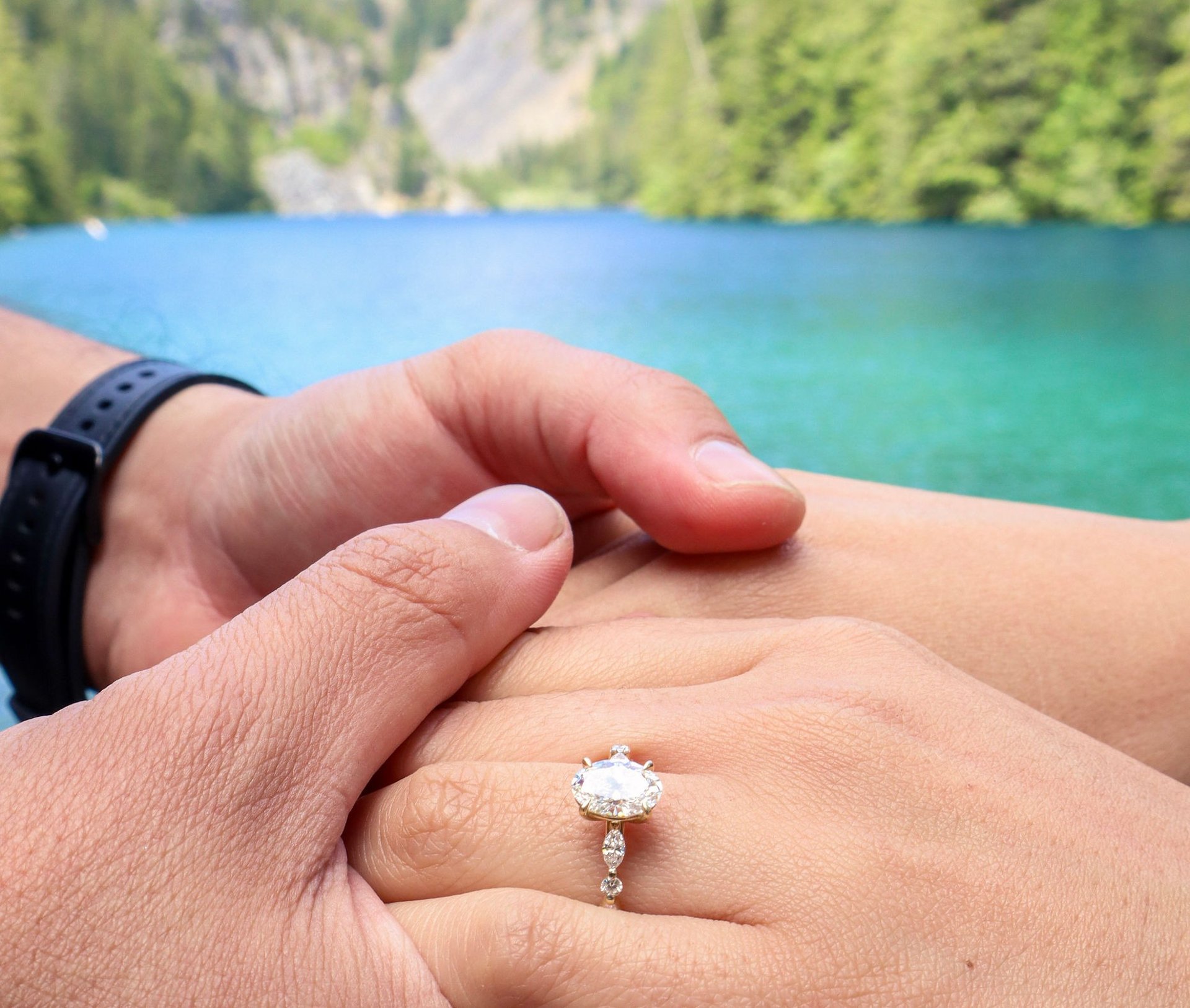 a woman stares into a man's eyes lovingly