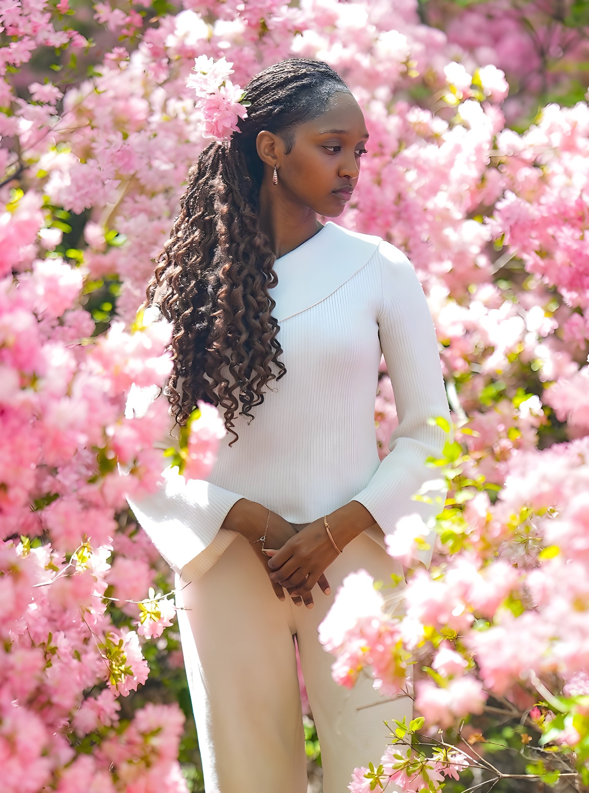 woman holding dried flower