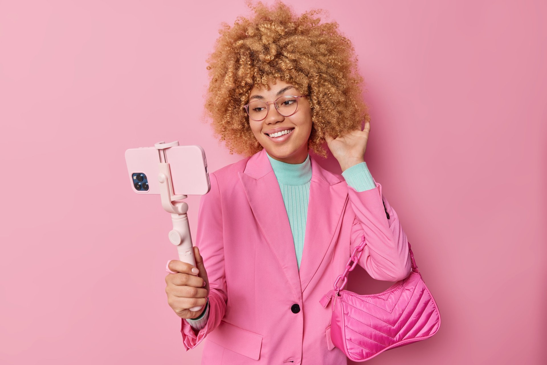 an abstract photo of a curved building with a blue sky in the background