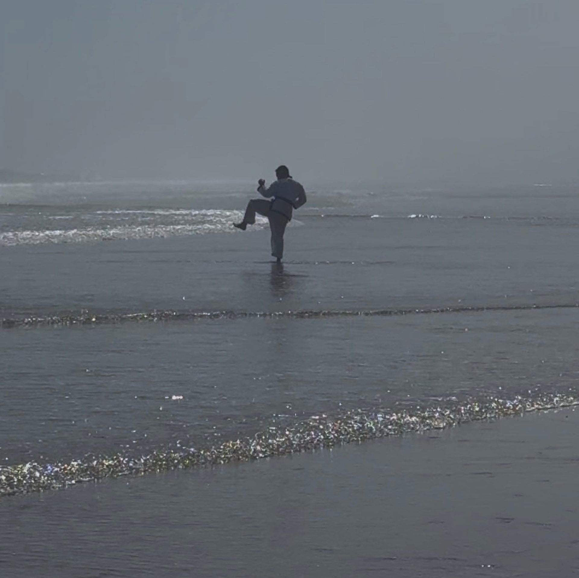 woman wearing yellow long-sleeved dress under white clouds and blue sky during daytime