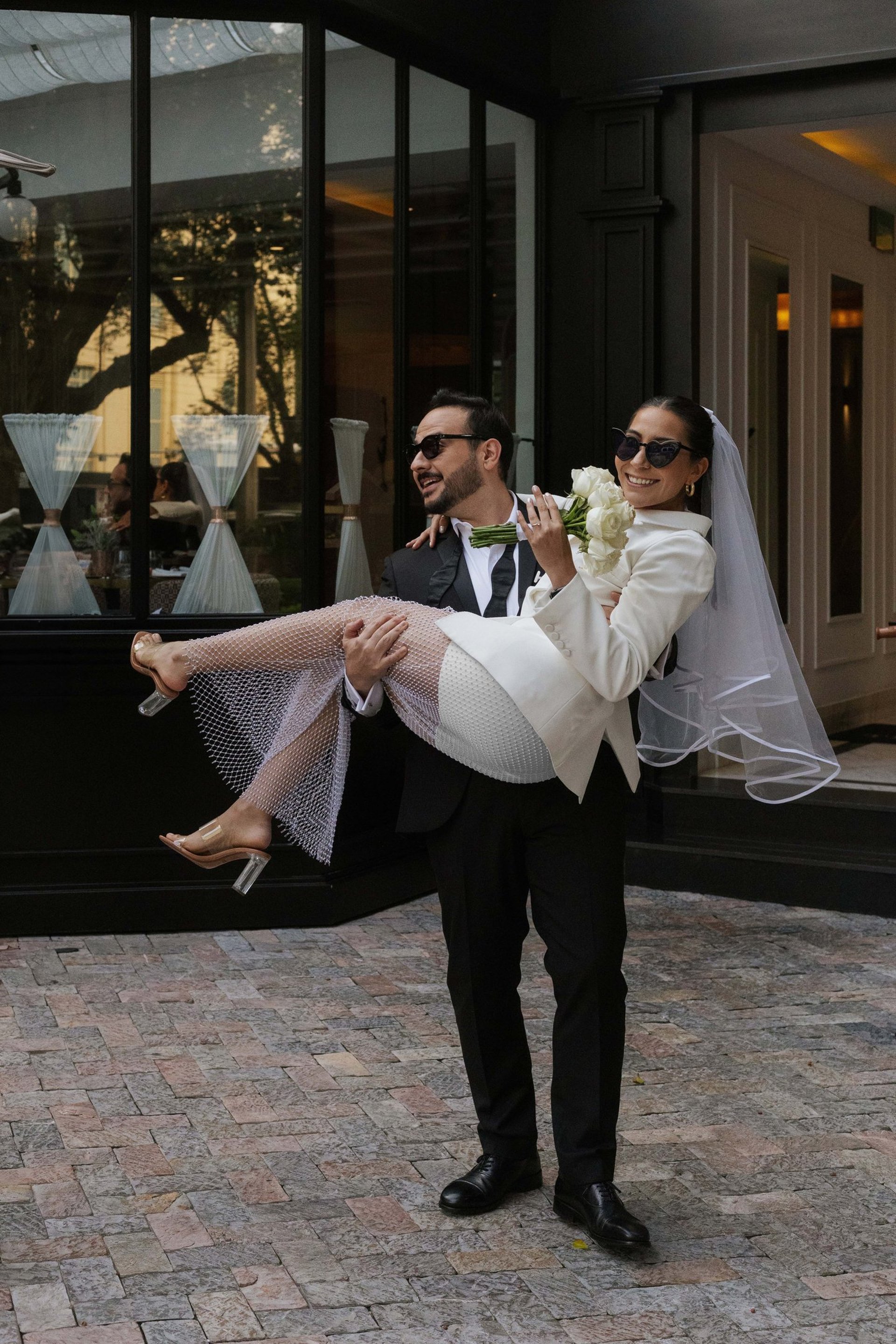 couple wearing silver-colored rings