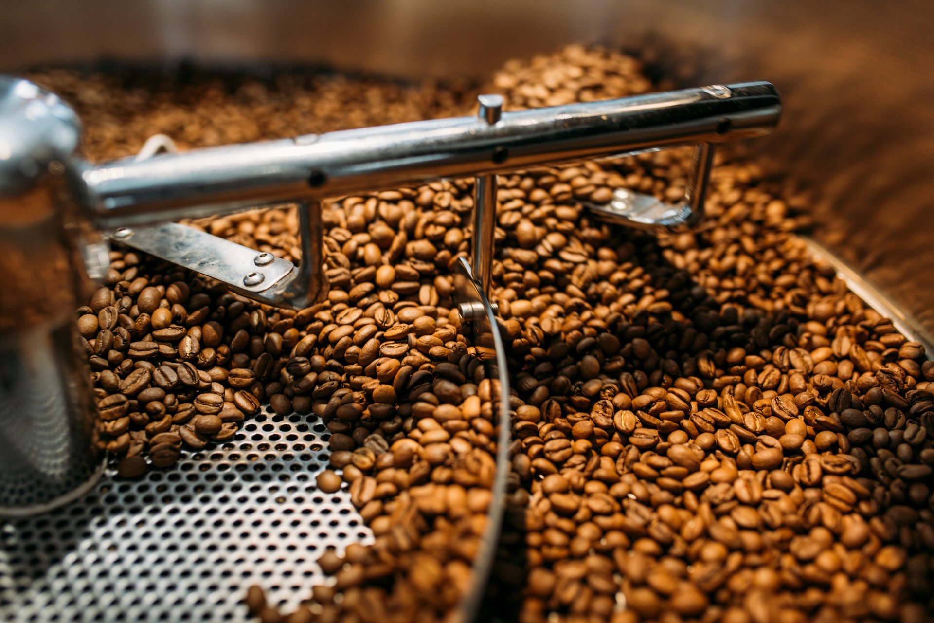 an abstract photo of a curved building with a blue sky in the background