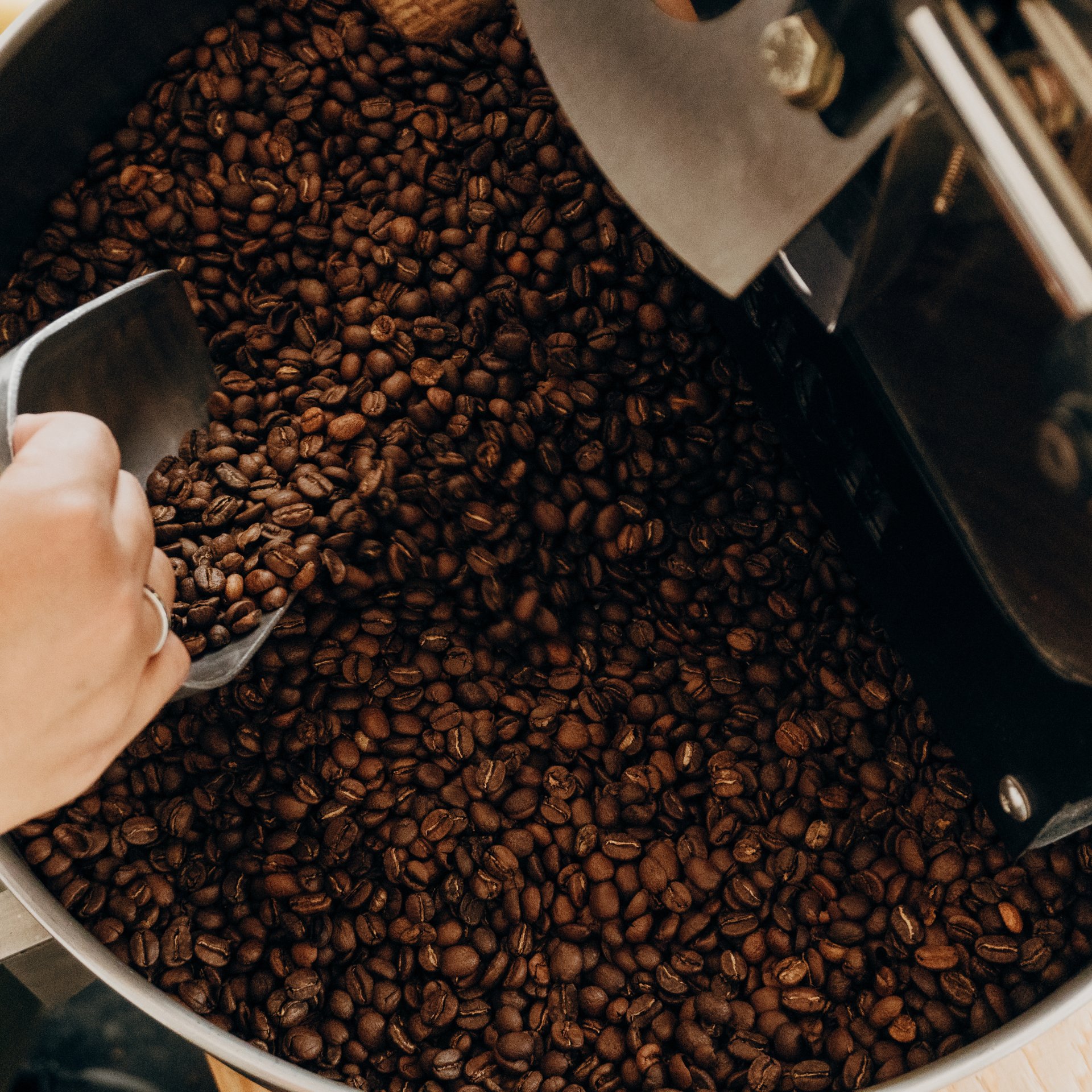 an abstract photo of a curved building with a blue sky in the background