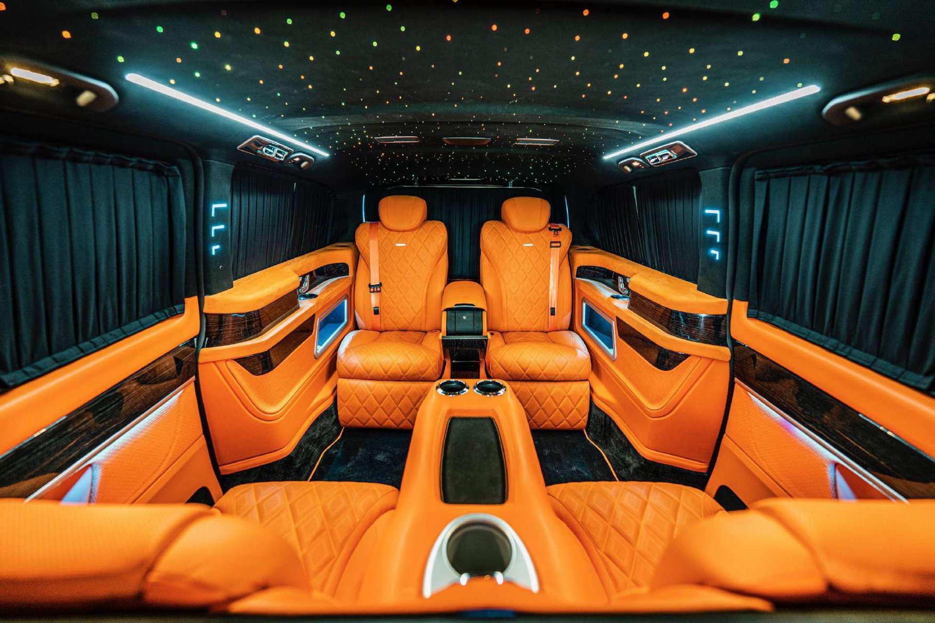 black and brown leather padded tub sofa