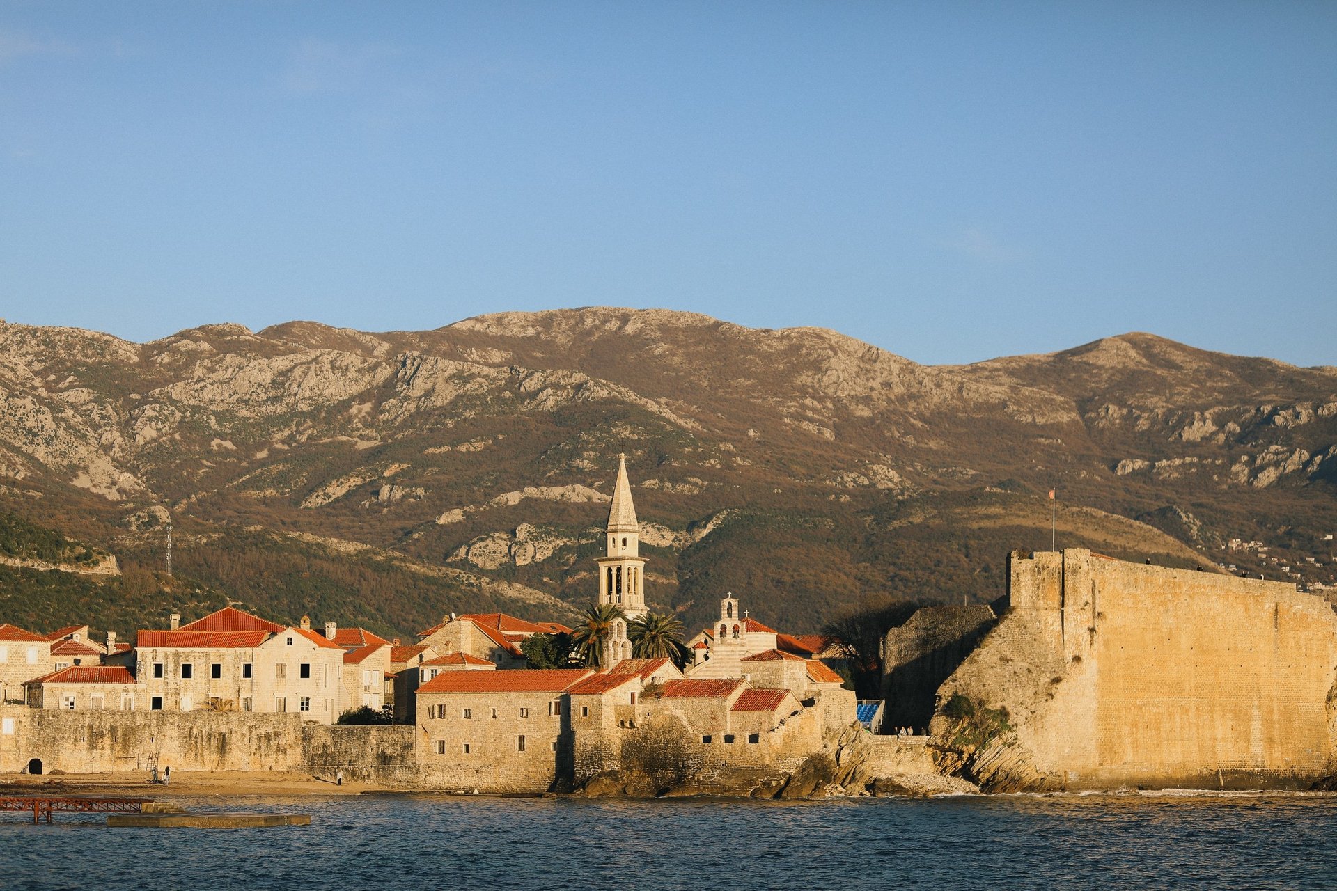 black and brown leather padded tub sofa