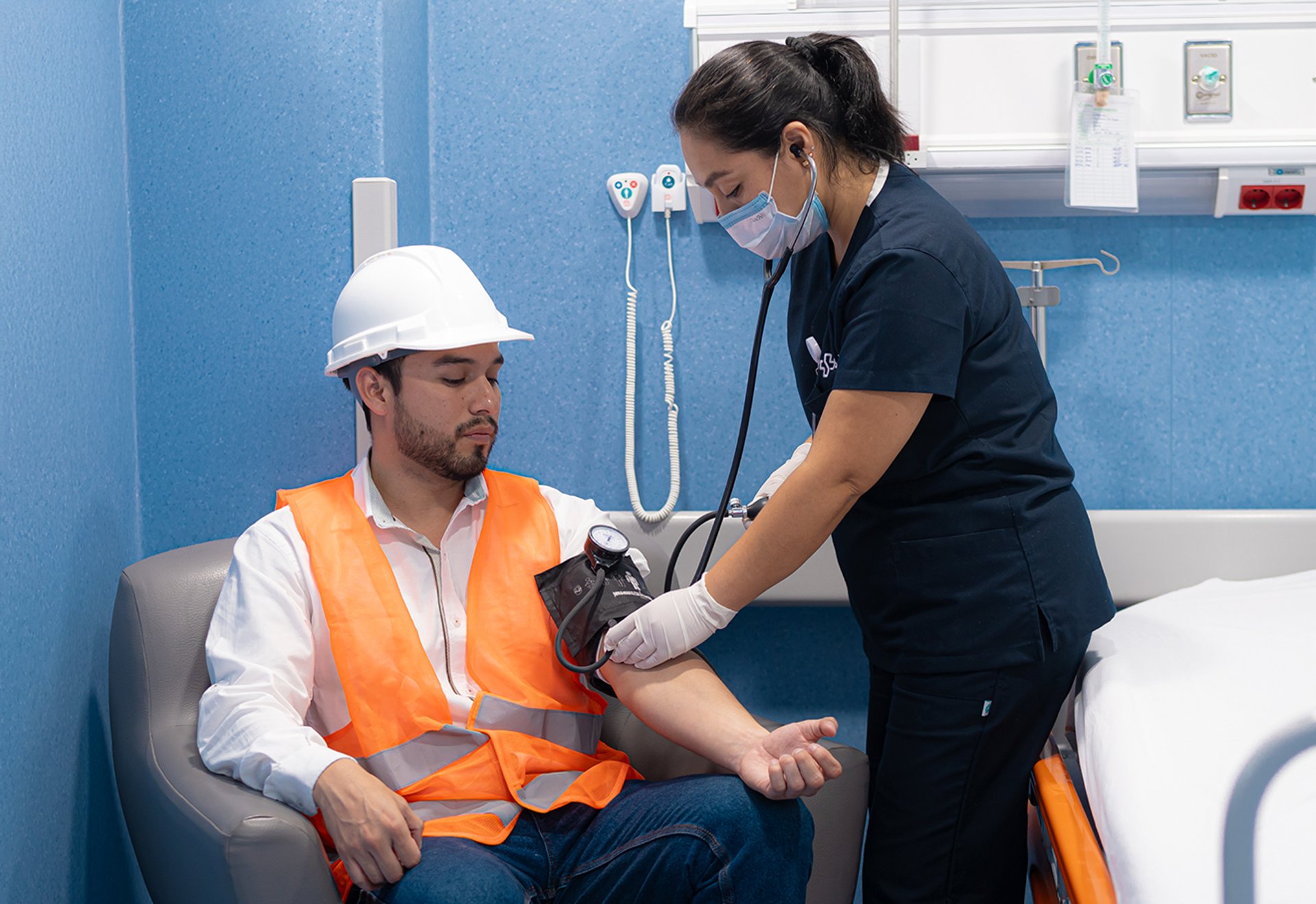 an abstract photo of a curved building with a blue sky in the background