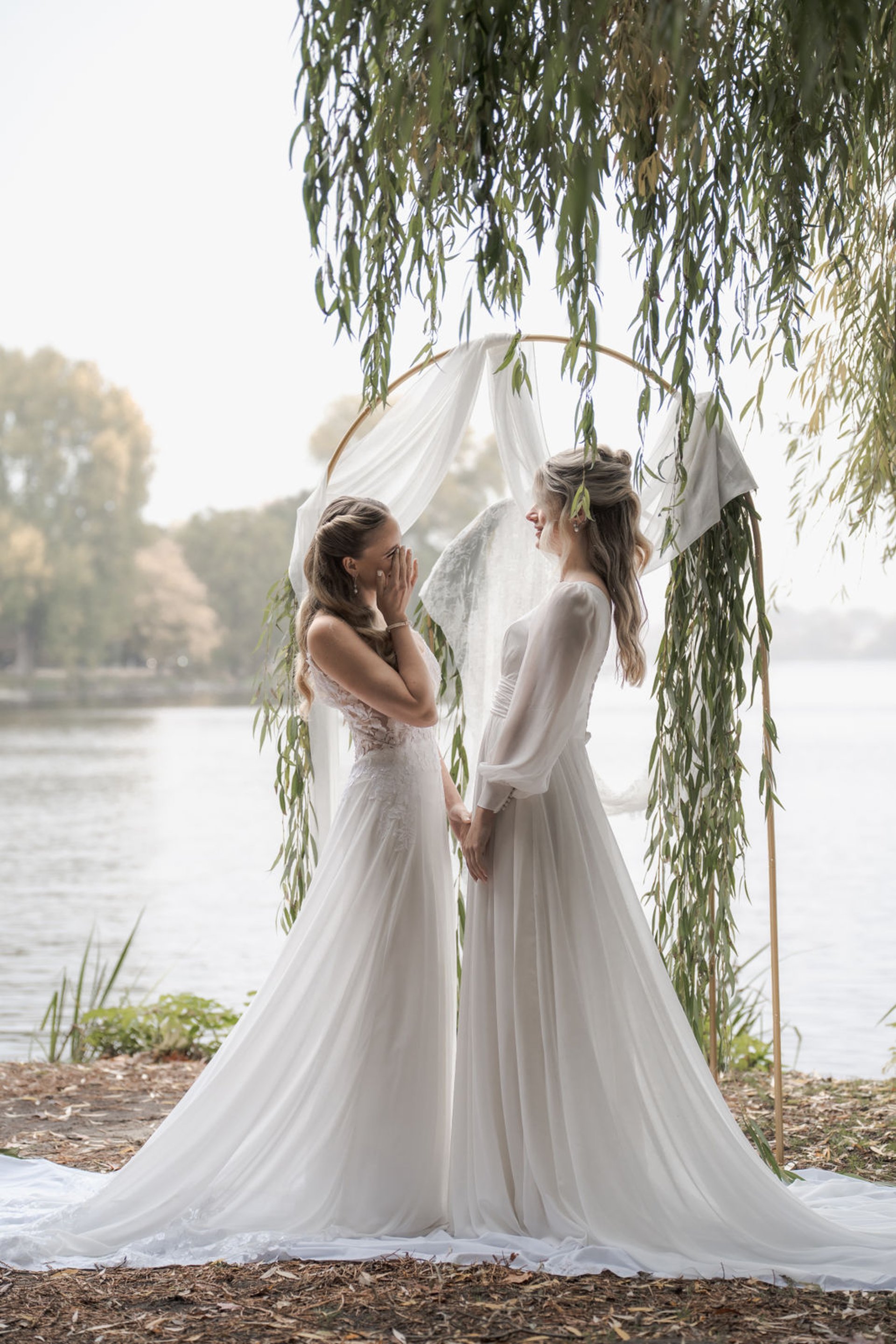 an abstract photo of a curved building with a blue sky in the background