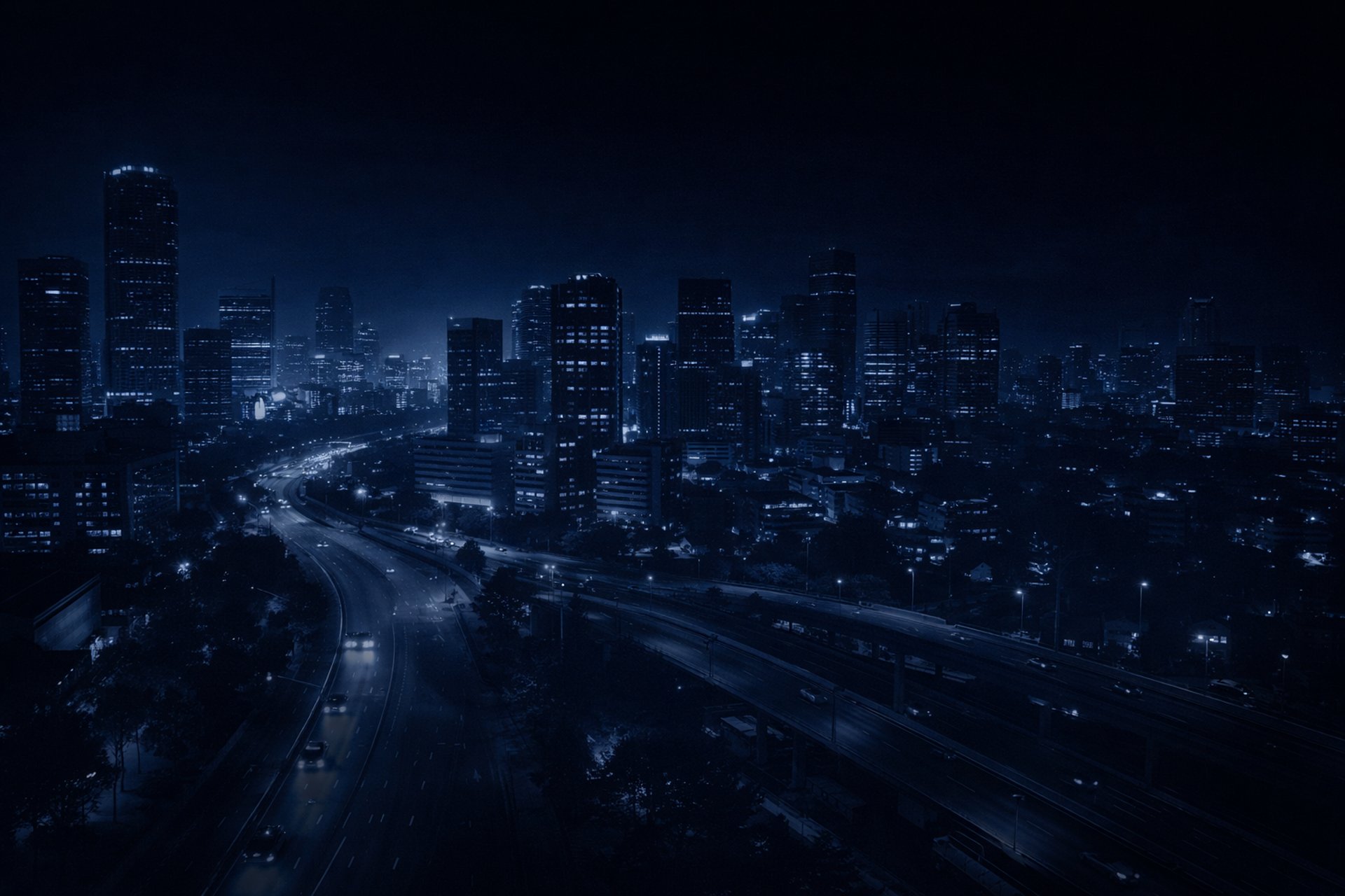 an abstract photo of a curved building with a blue sky in the background