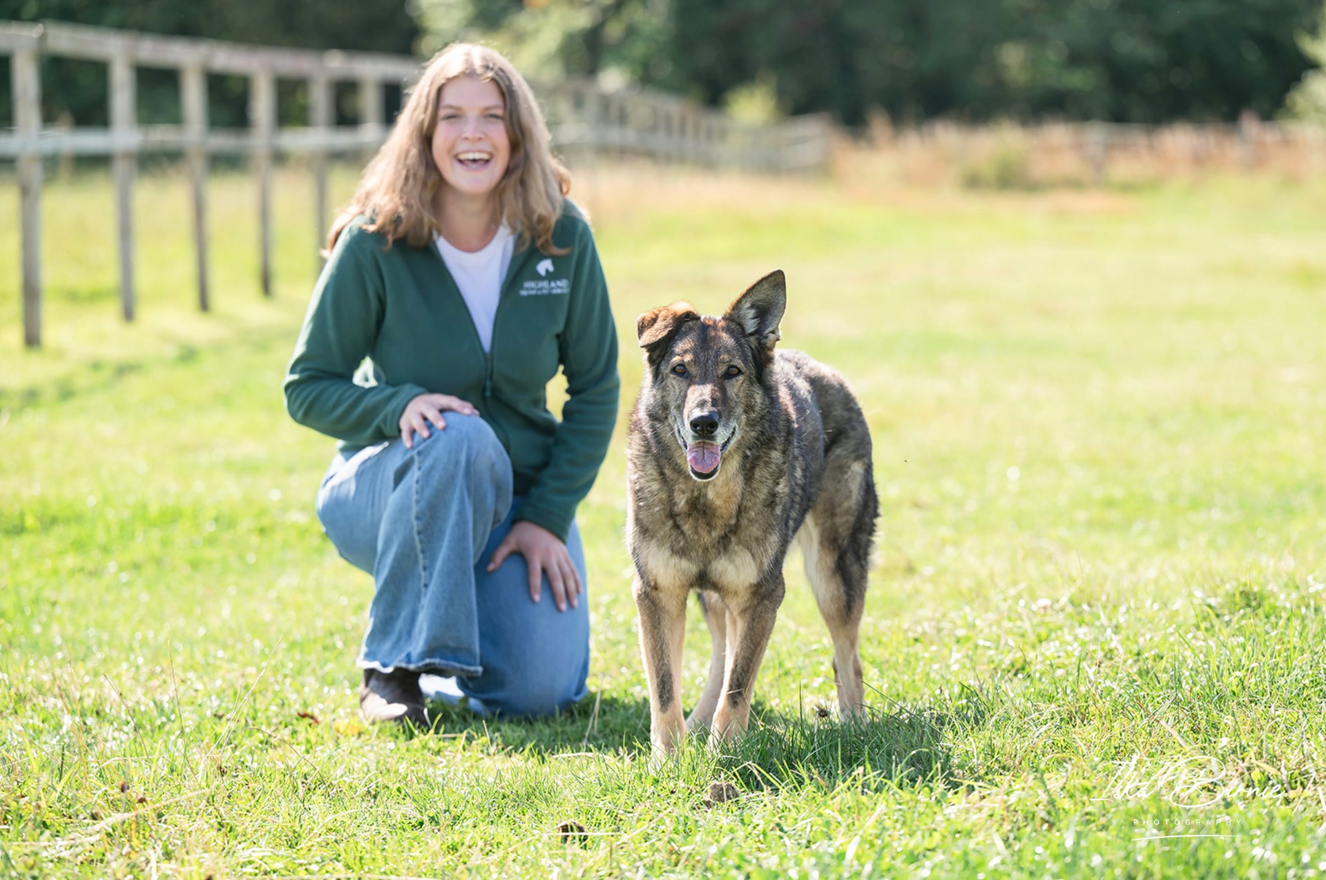 an abstract photo of a curved building with a blue sky in the background