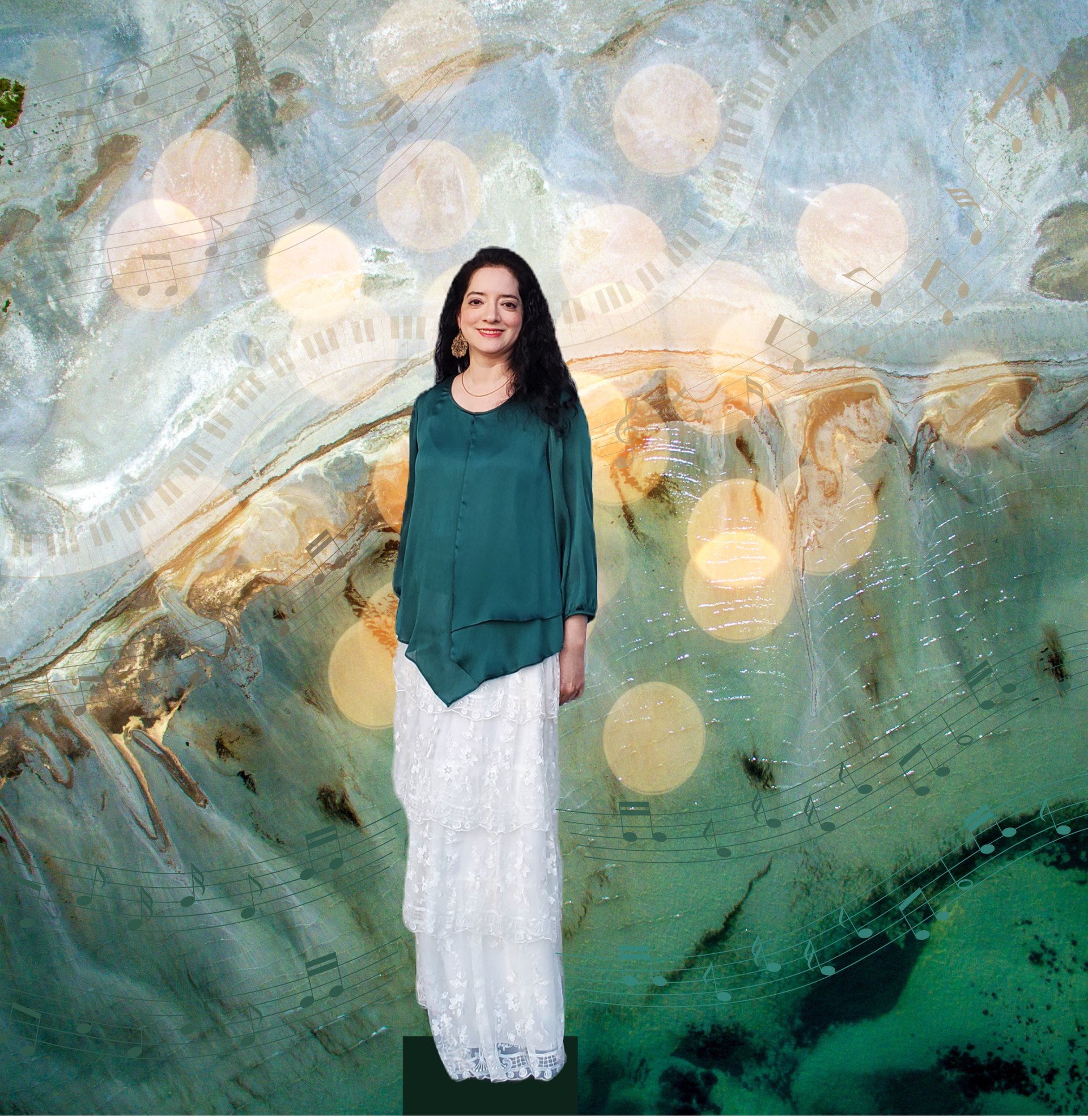 A white grand piano on an outdoor stage