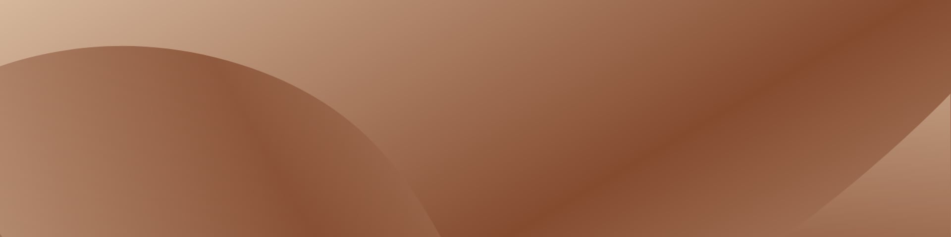 the sun is setting over the mountains and trees