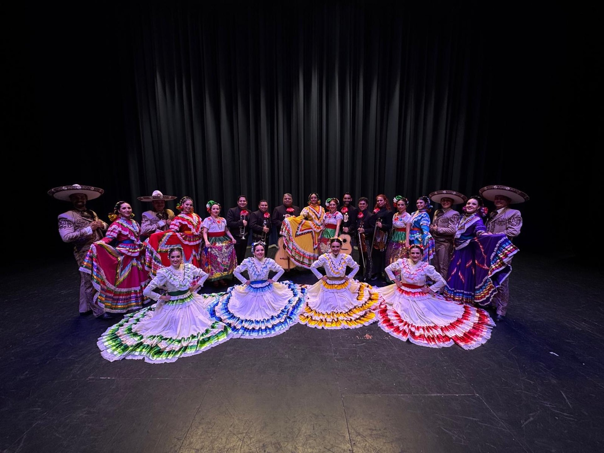 Mariachi band performing outdoors at an event