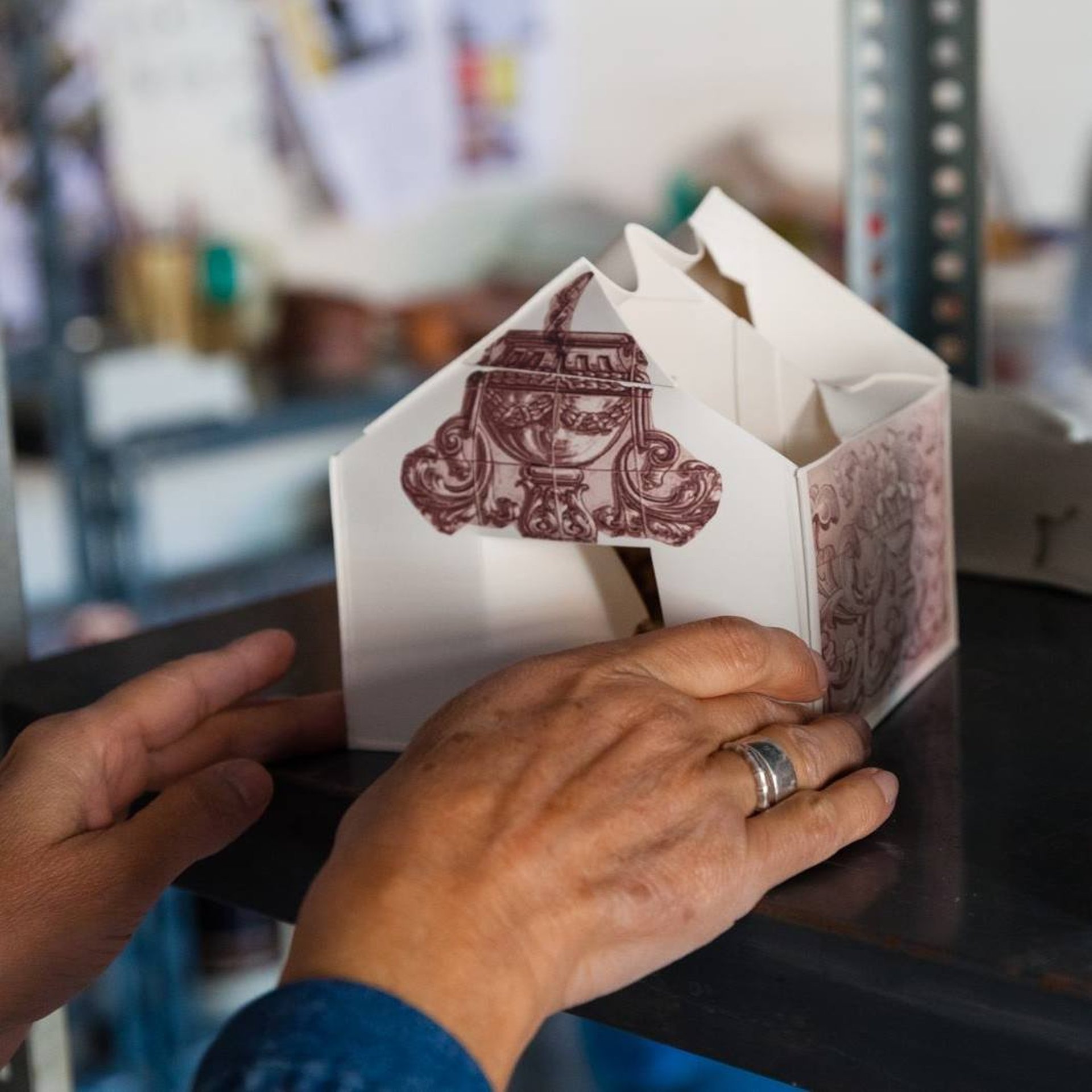 an abstract photo of a curved building with a blue sky in the background