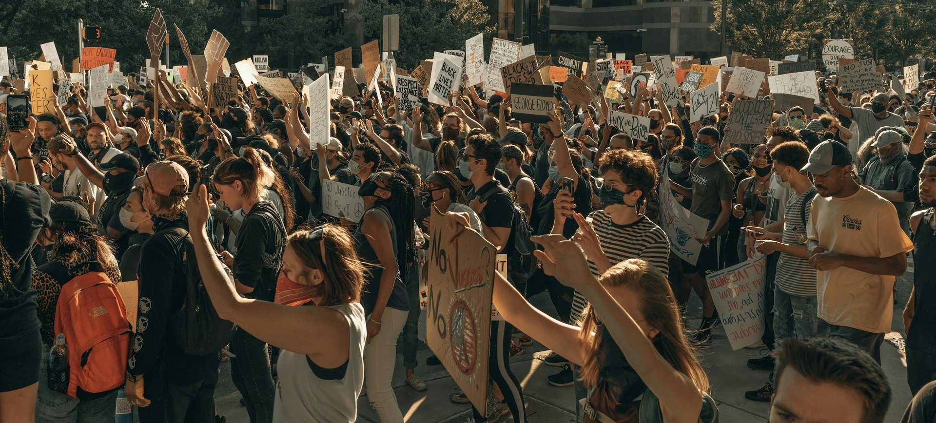 people gathering on street during daytime