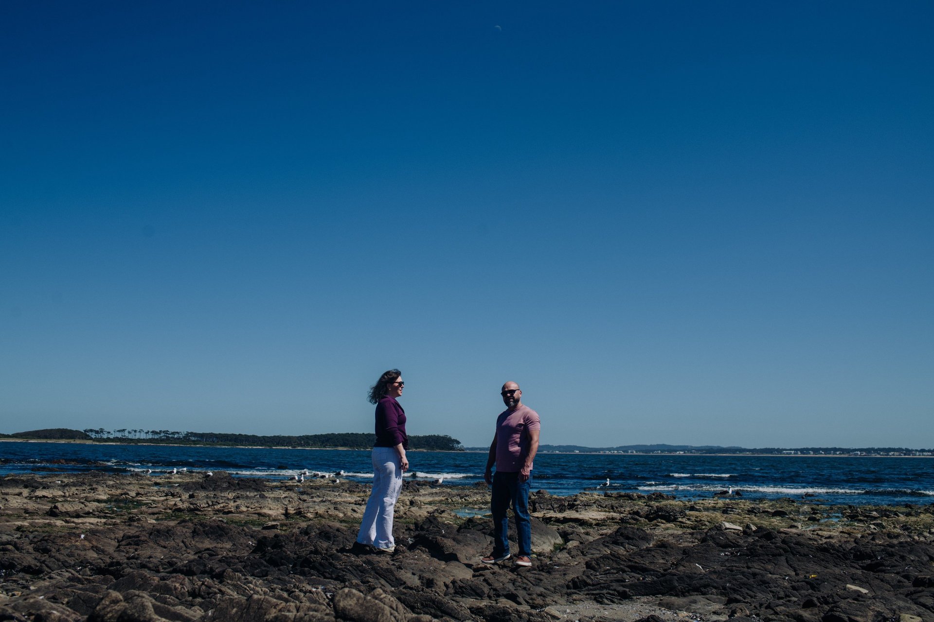 a close up of a black and brown abstract painting