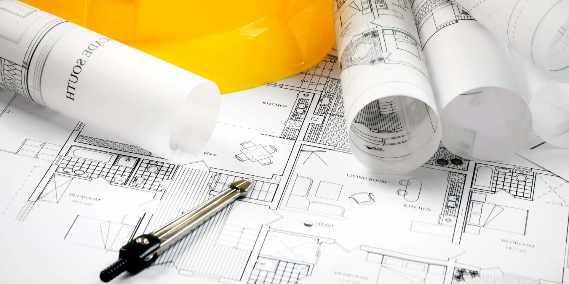 an abstract photo of a curved building with a blue sky in the background