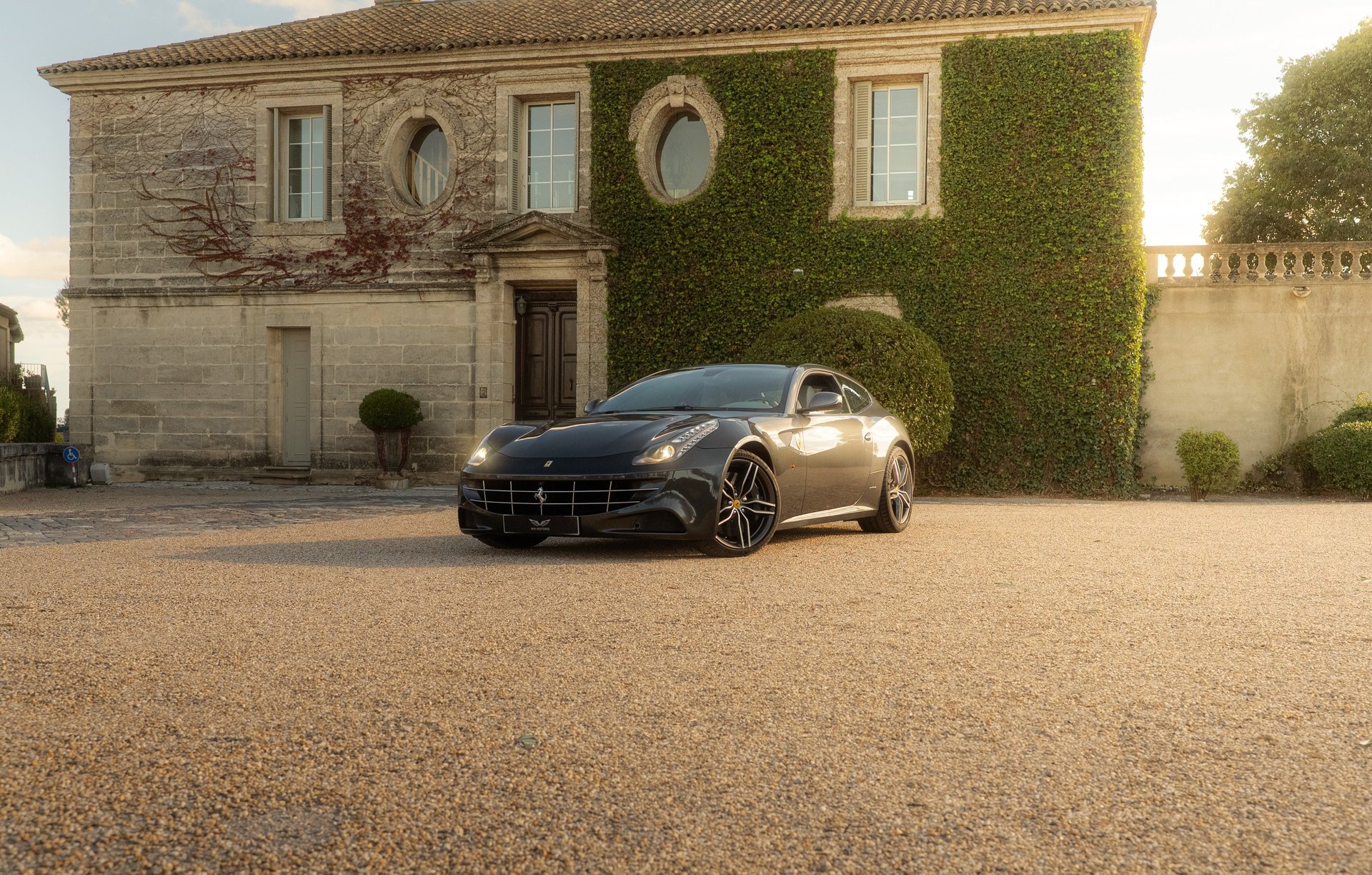 an abstract photo of a curved building with a blue sky in the background