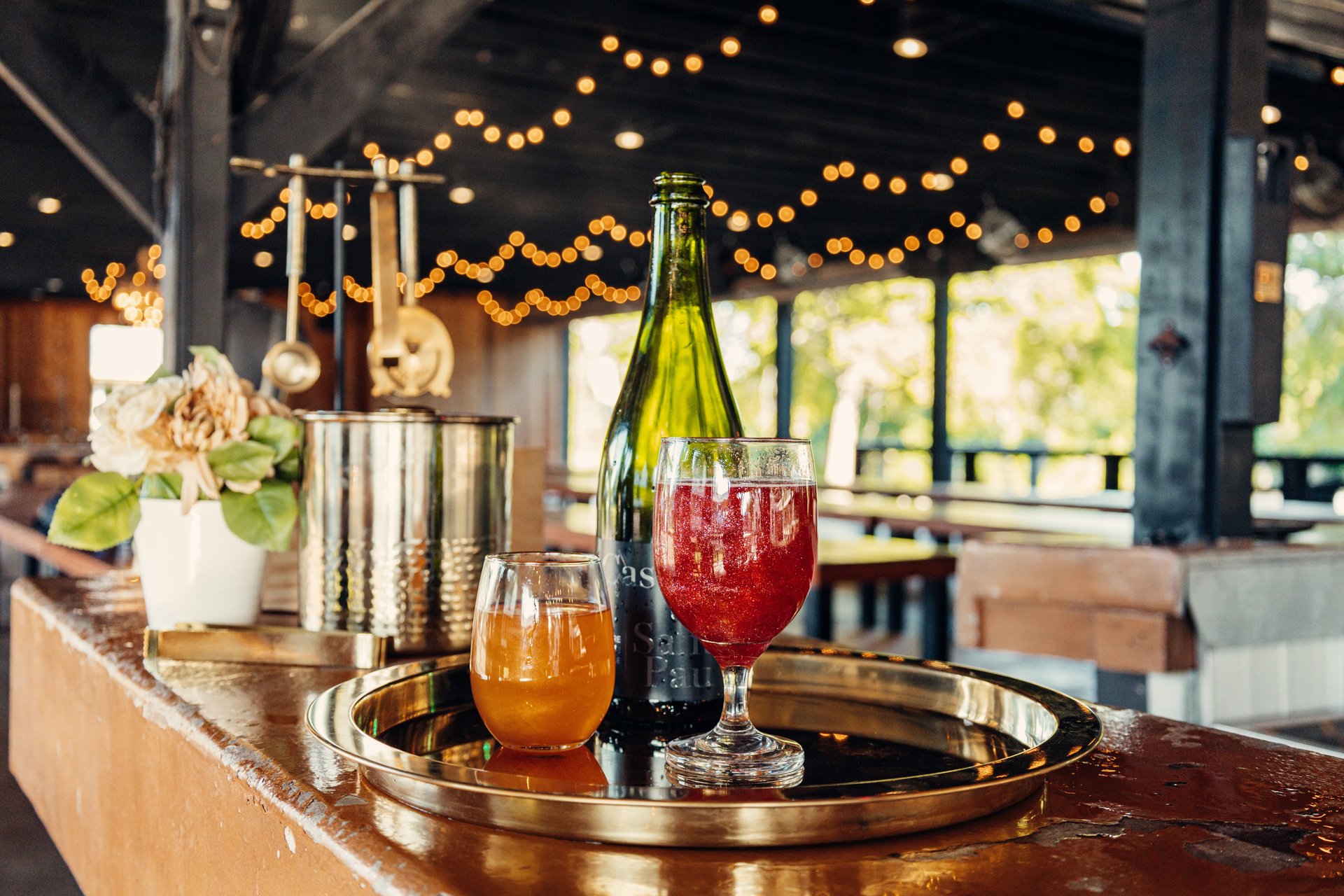 black and brown leather padded tub sofa