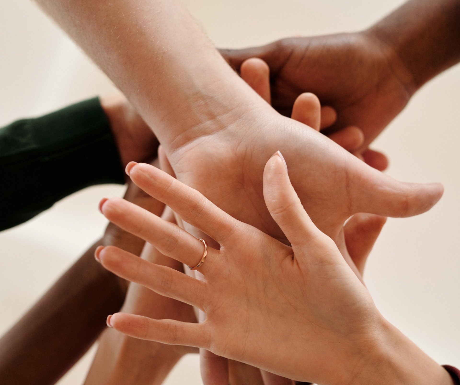 an abstract photo of a curved building with a blue sky in the background