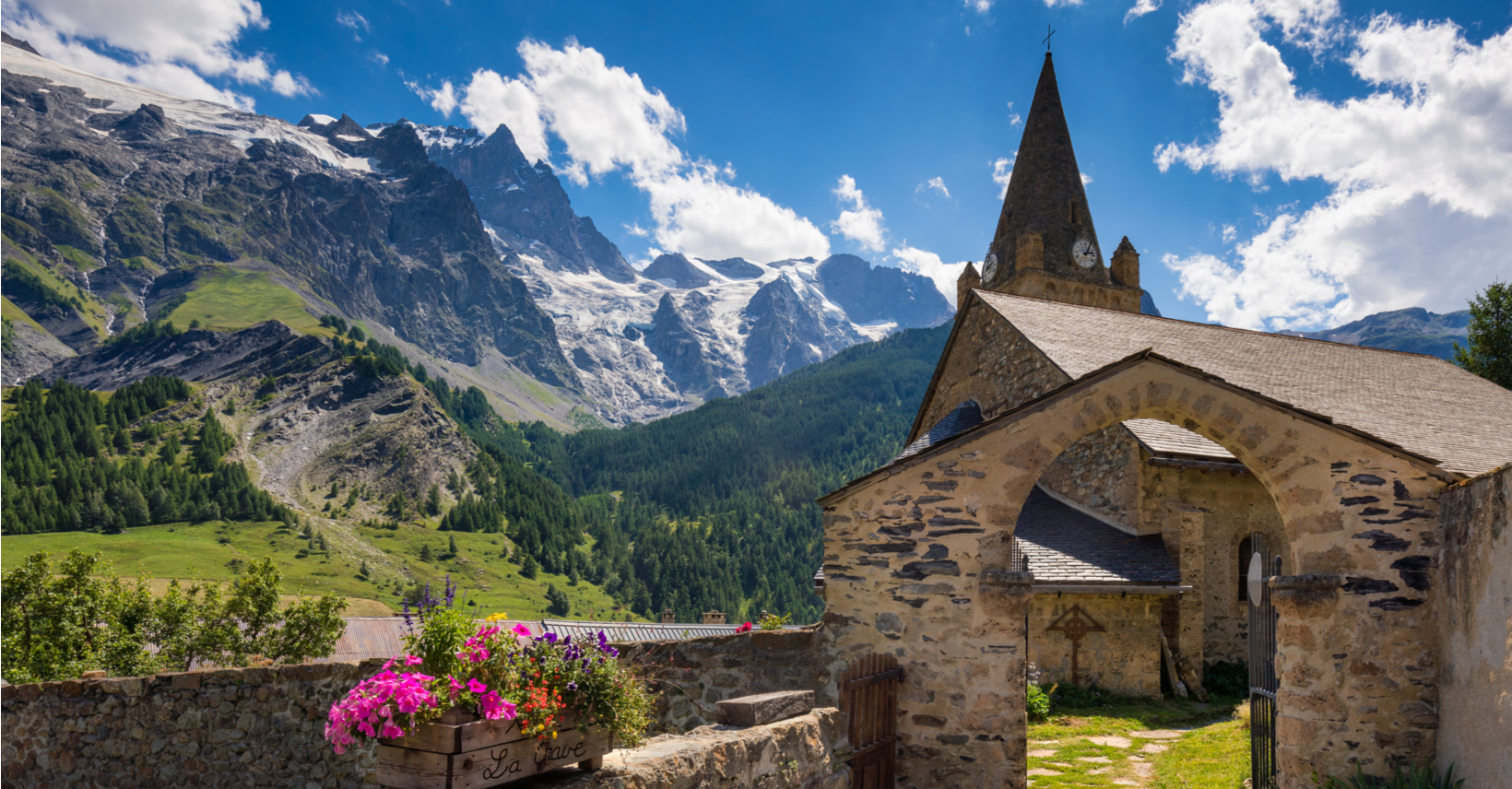 Alps France village church mountains snow blue sky