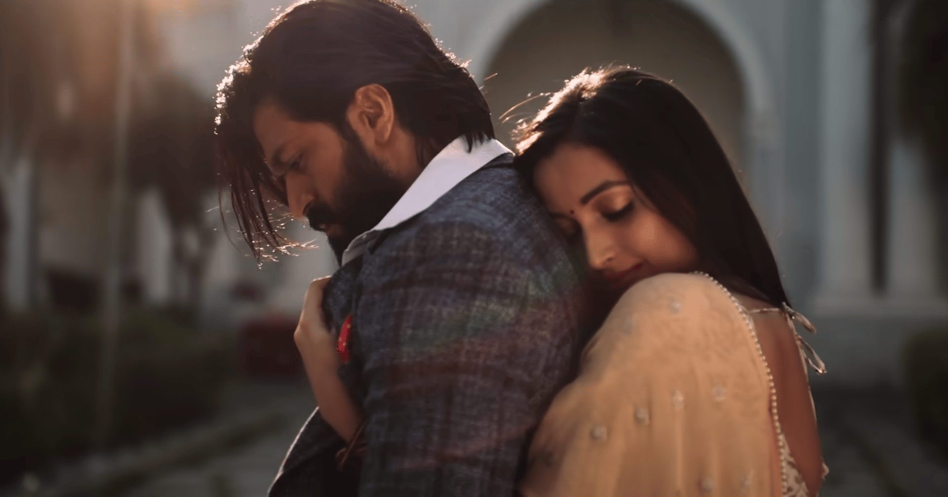 a man and woman in a suit and tie