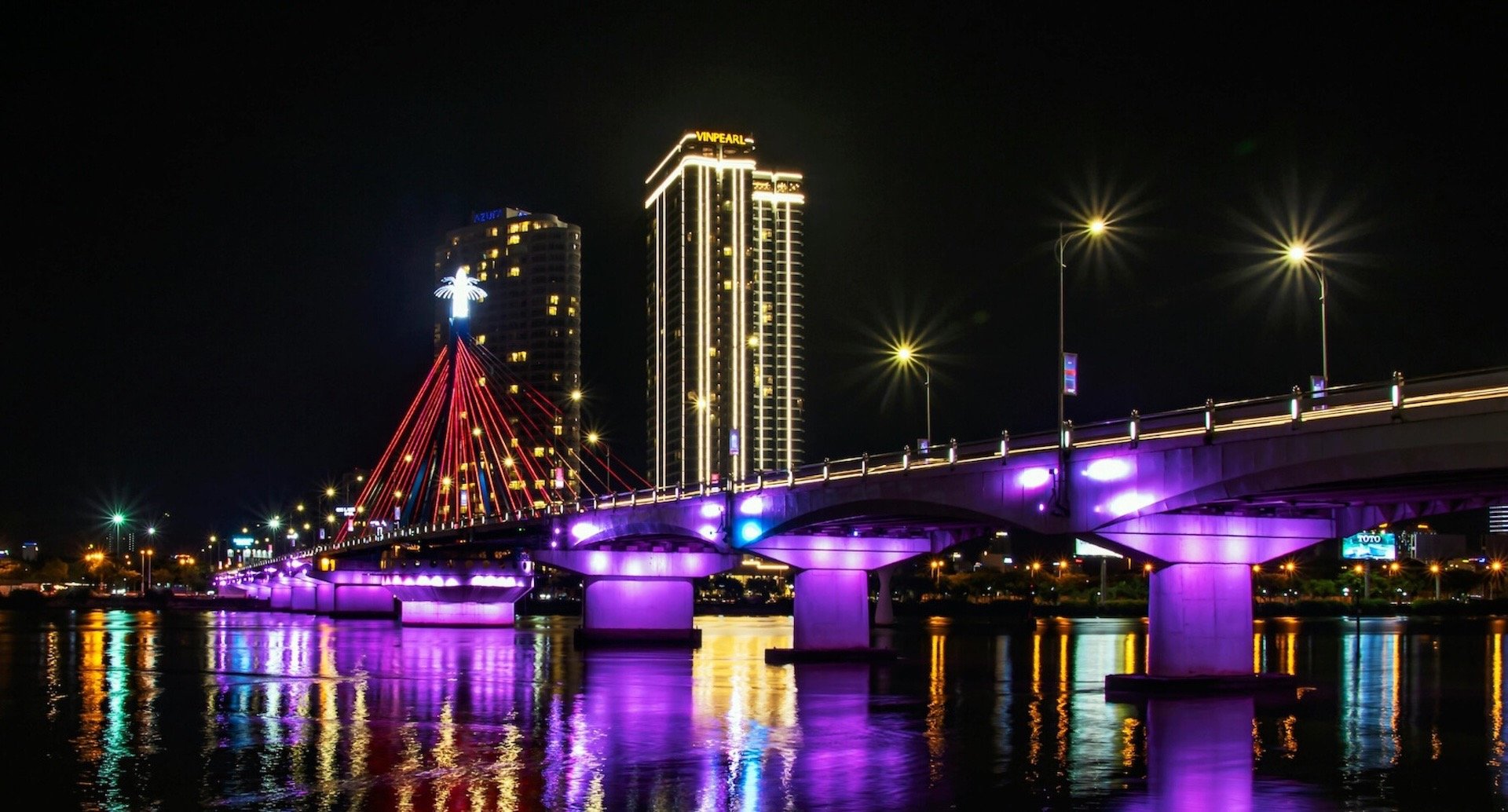 Night view of Han River Bridge with lights in Da Nang