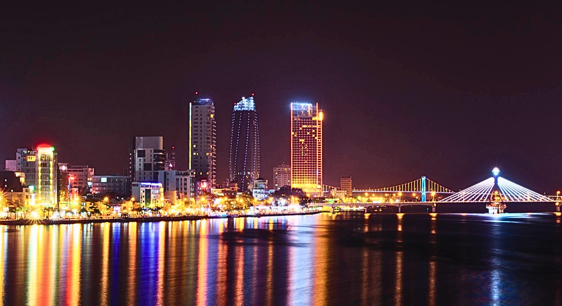 Da Nang's Hai Chau district at night with illuminated skyline and bridges