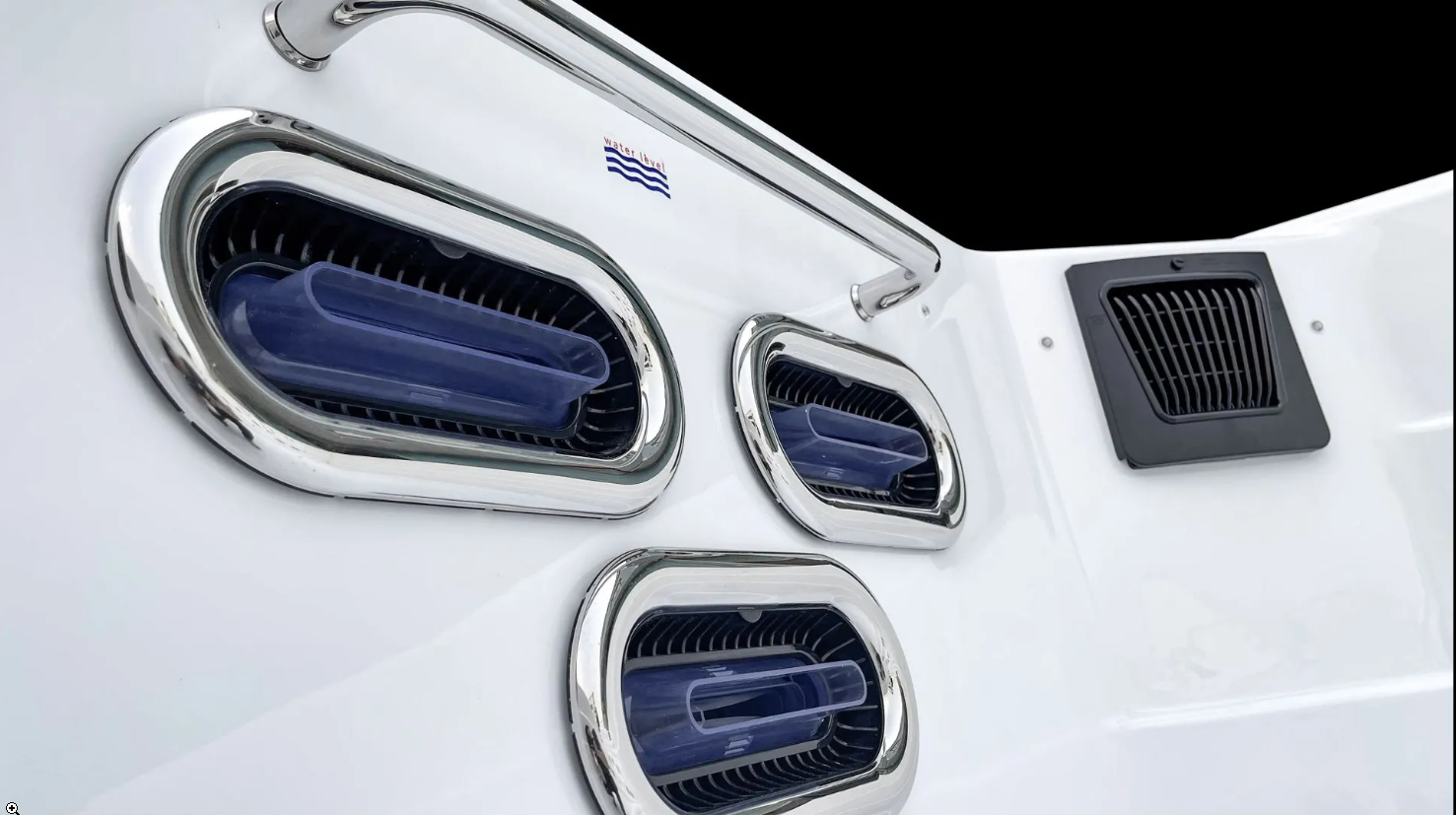 a close up of a white boat with blue and white trim