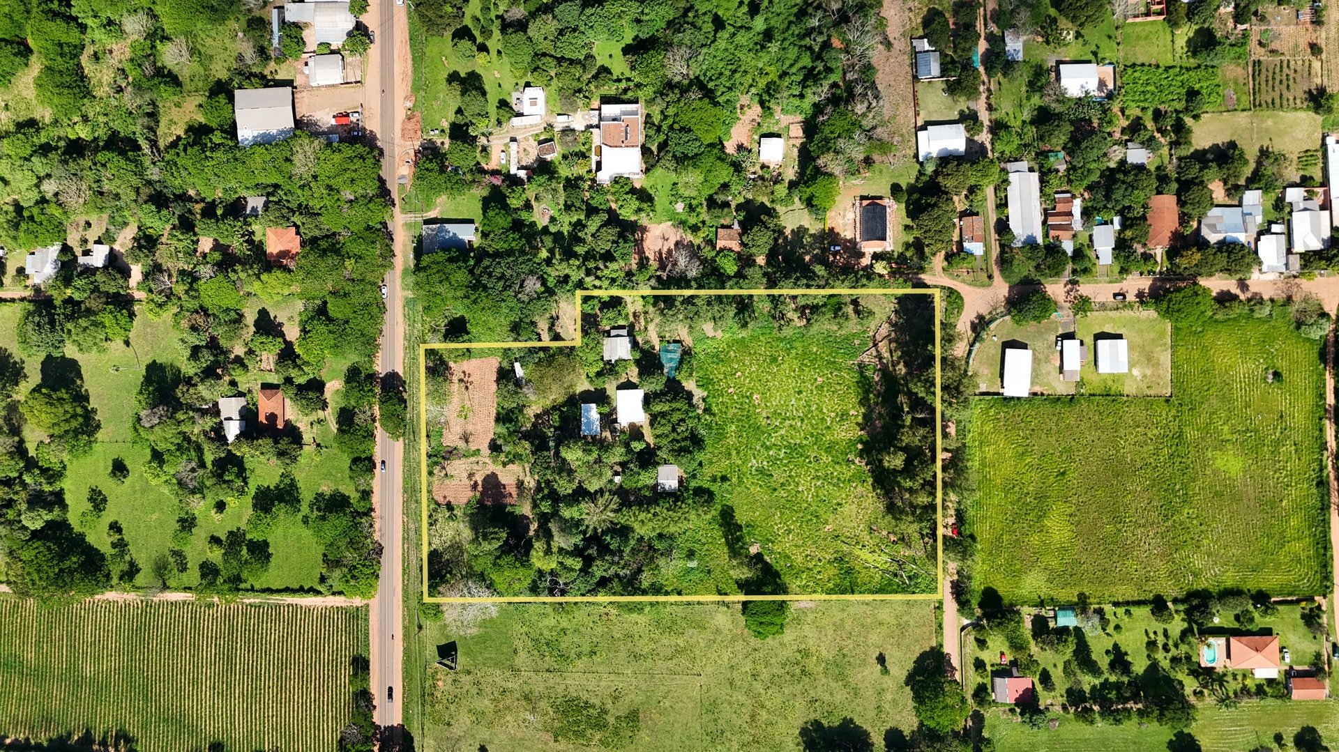 Zwei unmöblierte Häuser mit Garten und Altbaumbestand in Planta Urbana