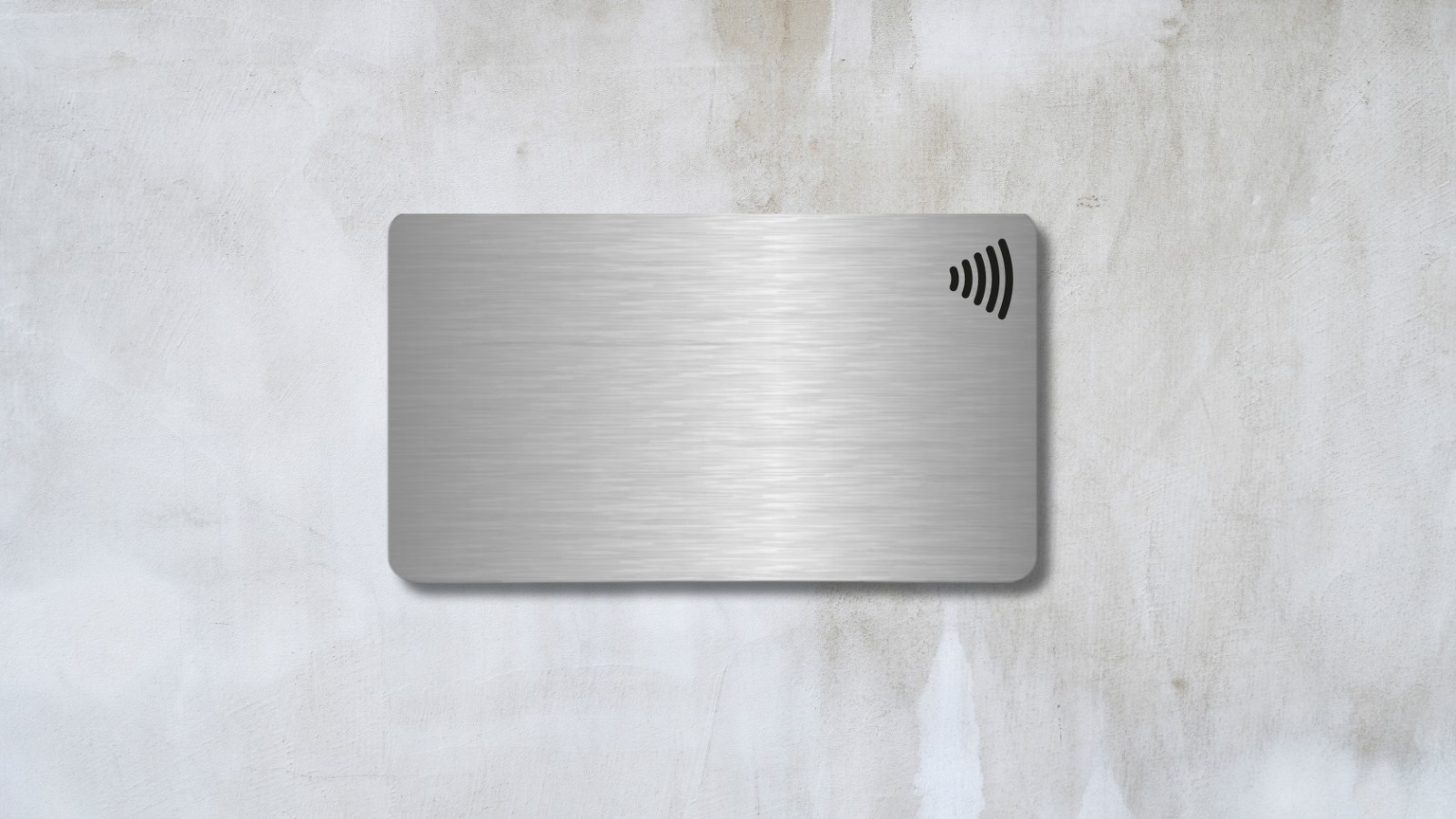 a metal NFC card with a wireless logo on top. made in paranaque